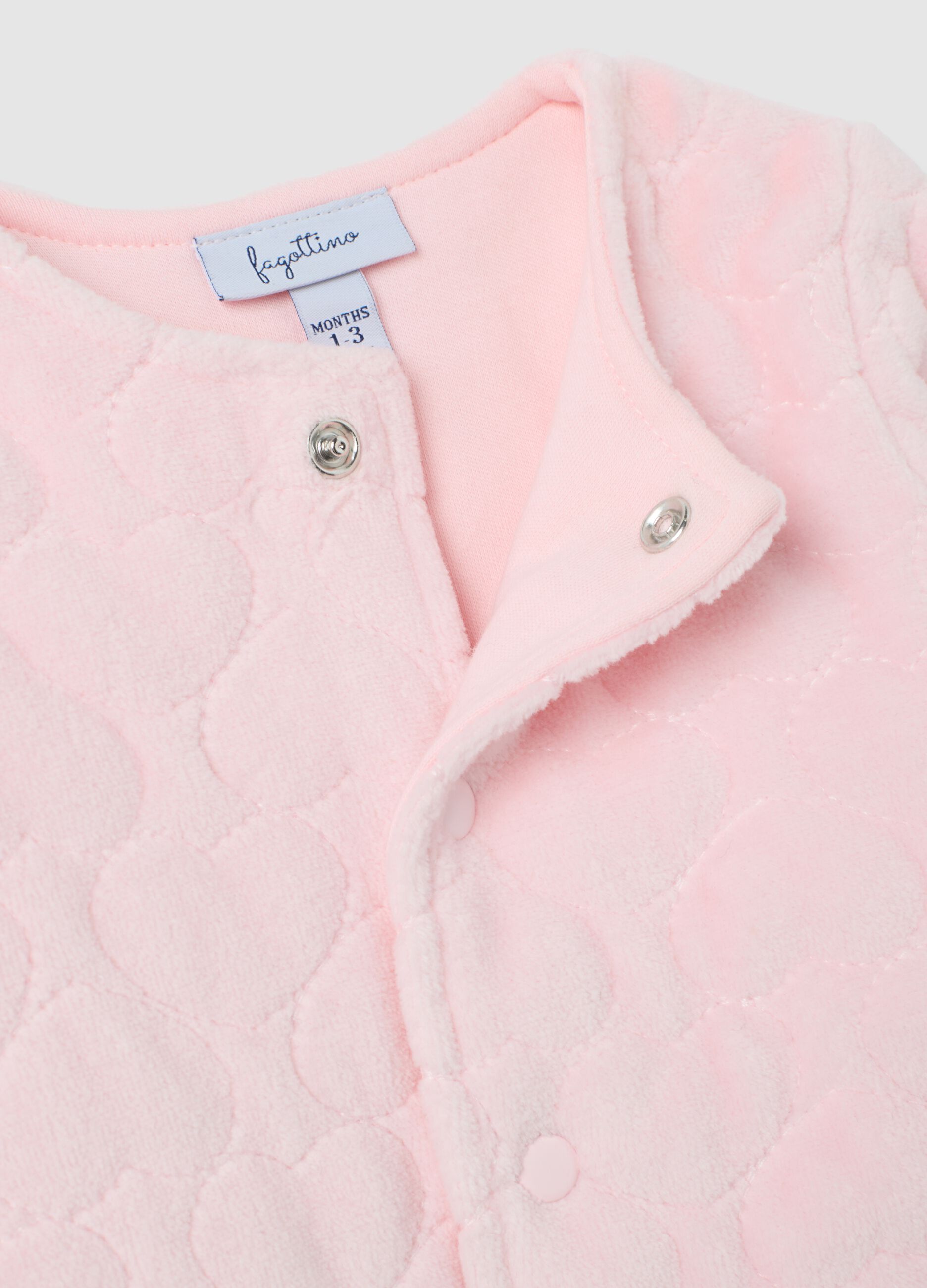 Pink cotton baby jacket with snap closure