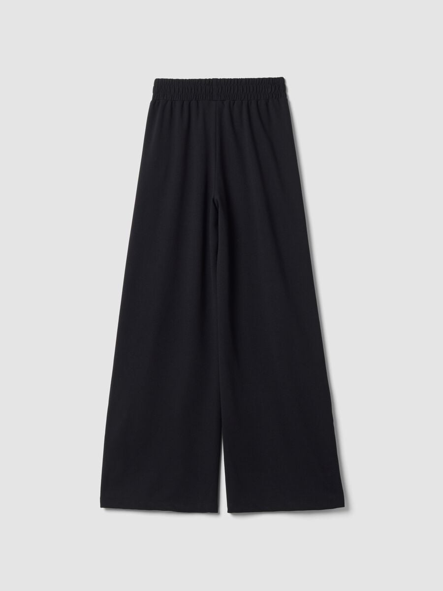 Pantaloni neri wide leg in viscosa elasticizzata con bande a contrasto_1