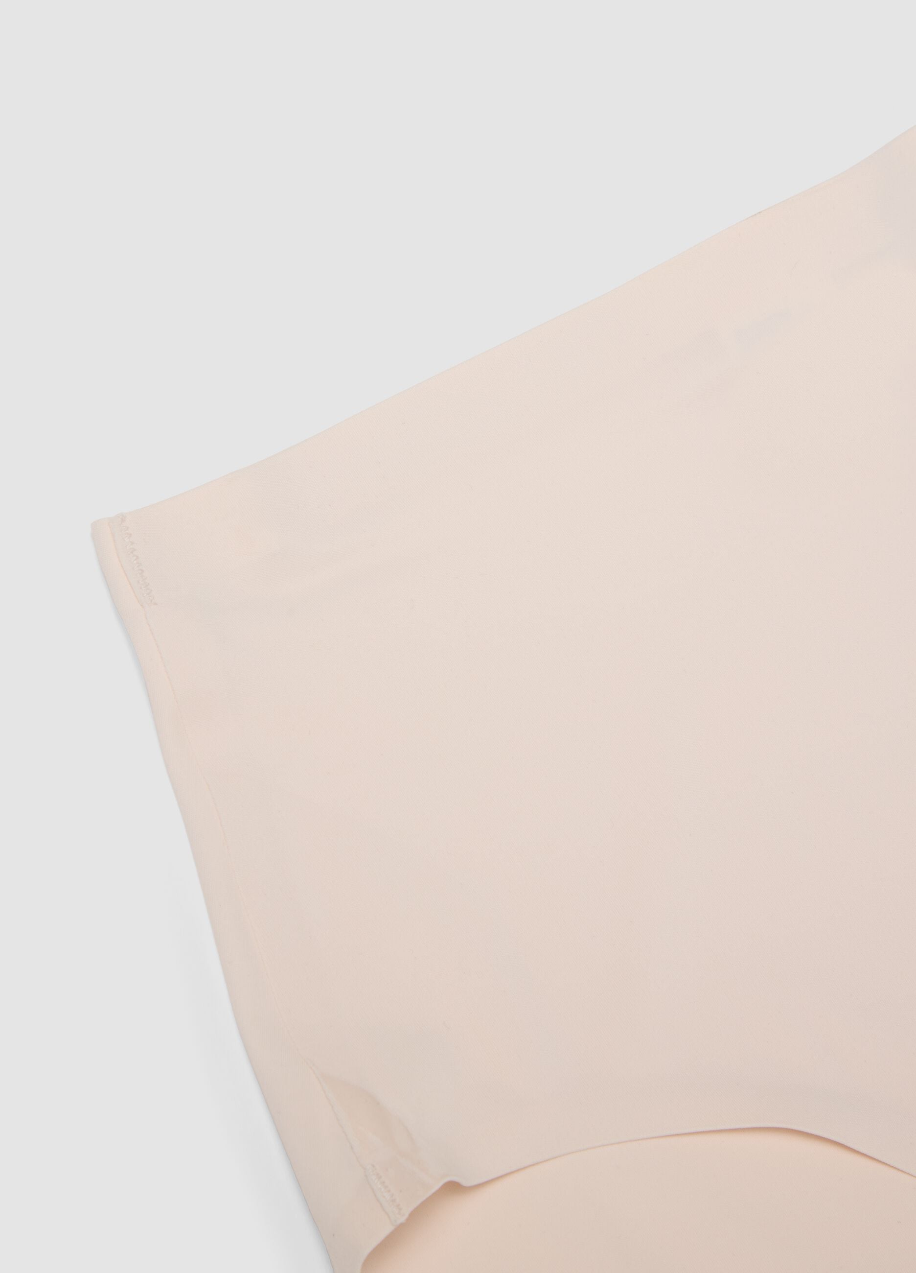 Pink high-waisted Brazilian briefs in stretch fabric with a shaping effect