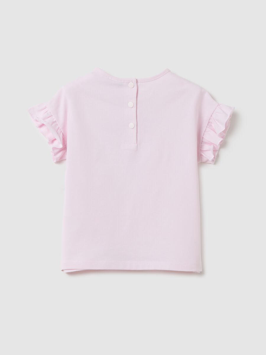 Pink T-shirt with ruffles and floral print_1