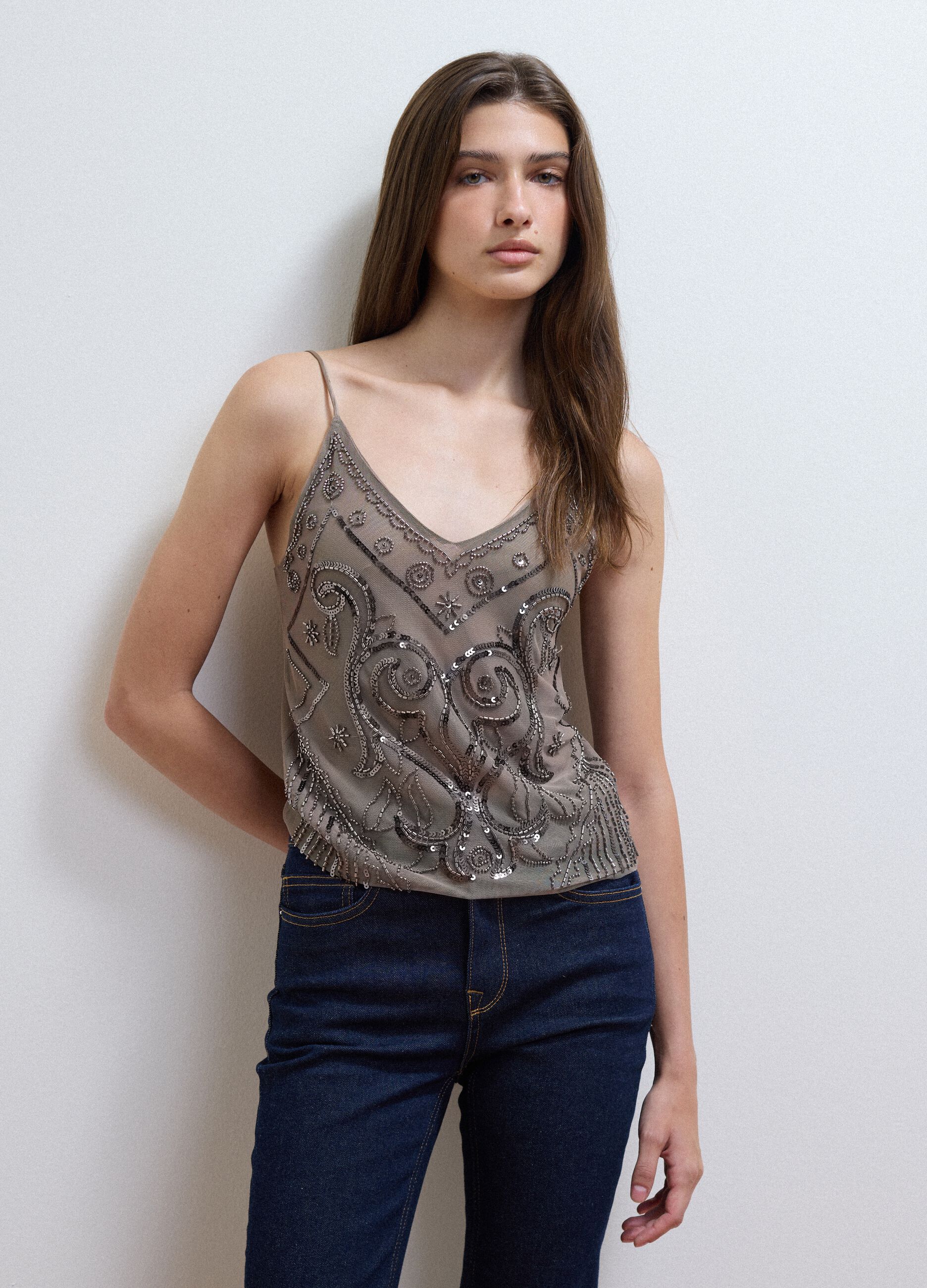 Beige fitted tank top with thin straps in stretch fabric