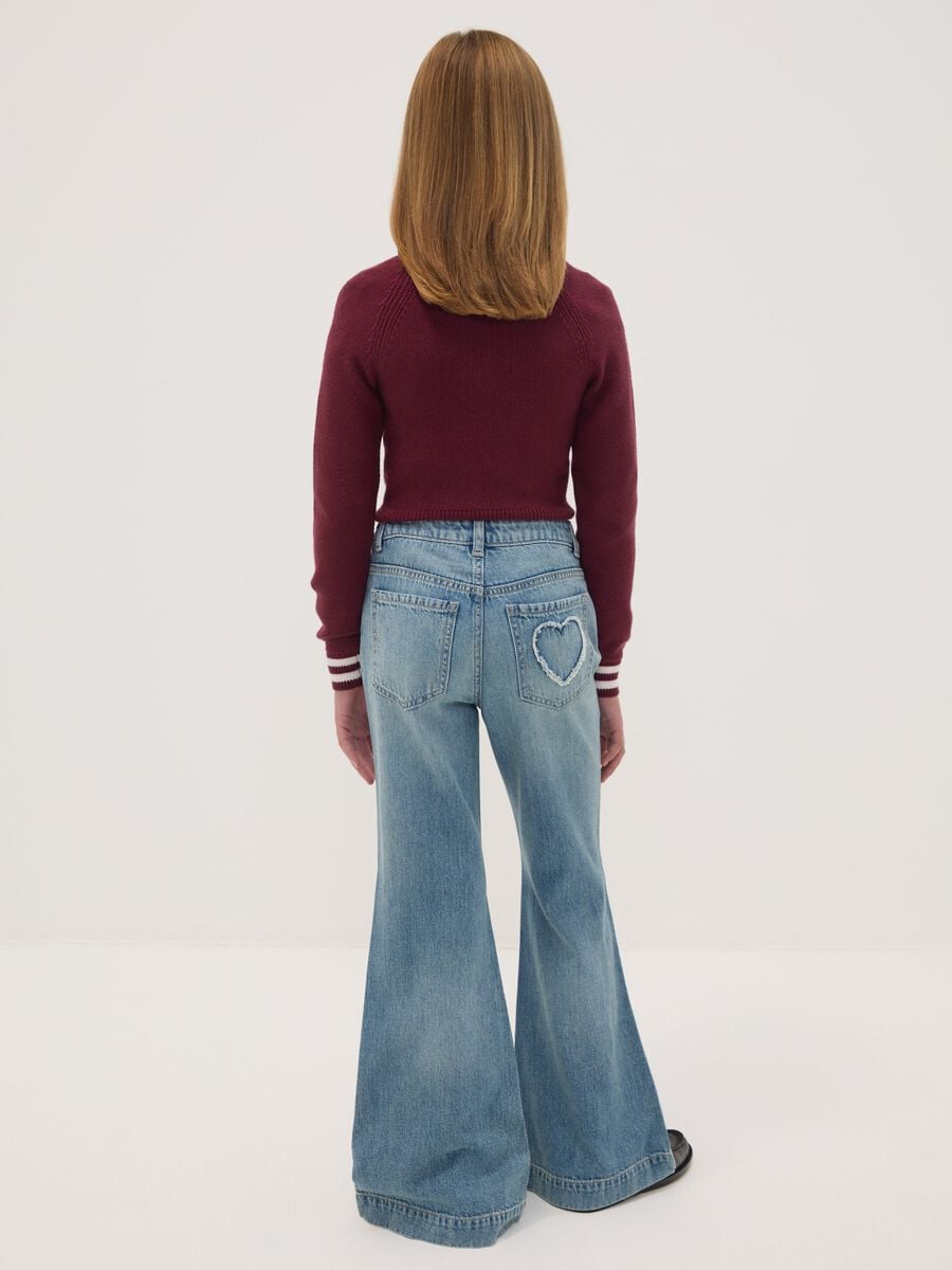 Jeans azzurri flare in puro cotone_1