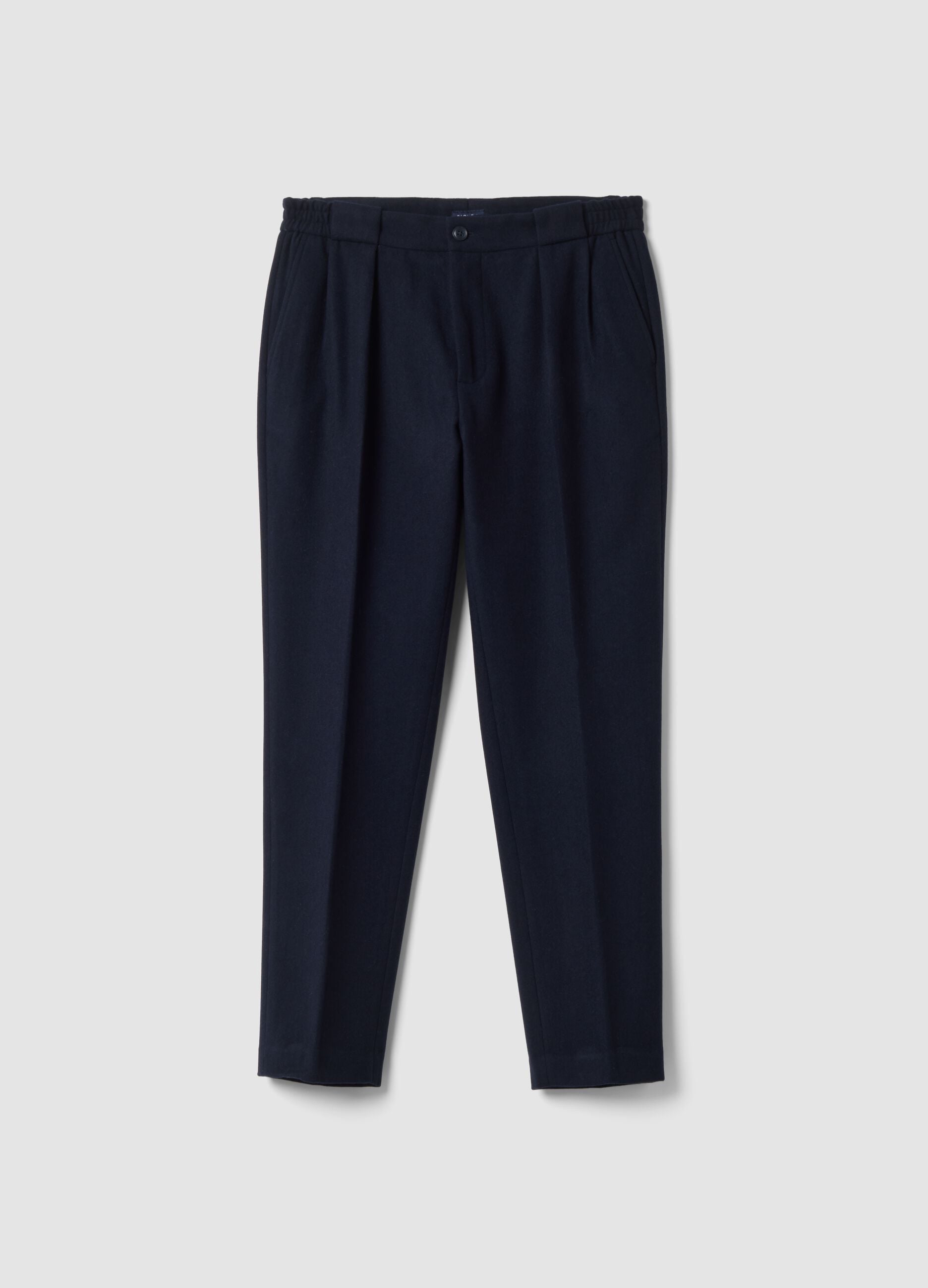 Navy blue formal carrot-fit trousers in wool and viscose blend