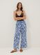 Blue and white organic cotton trousers with floral print_0