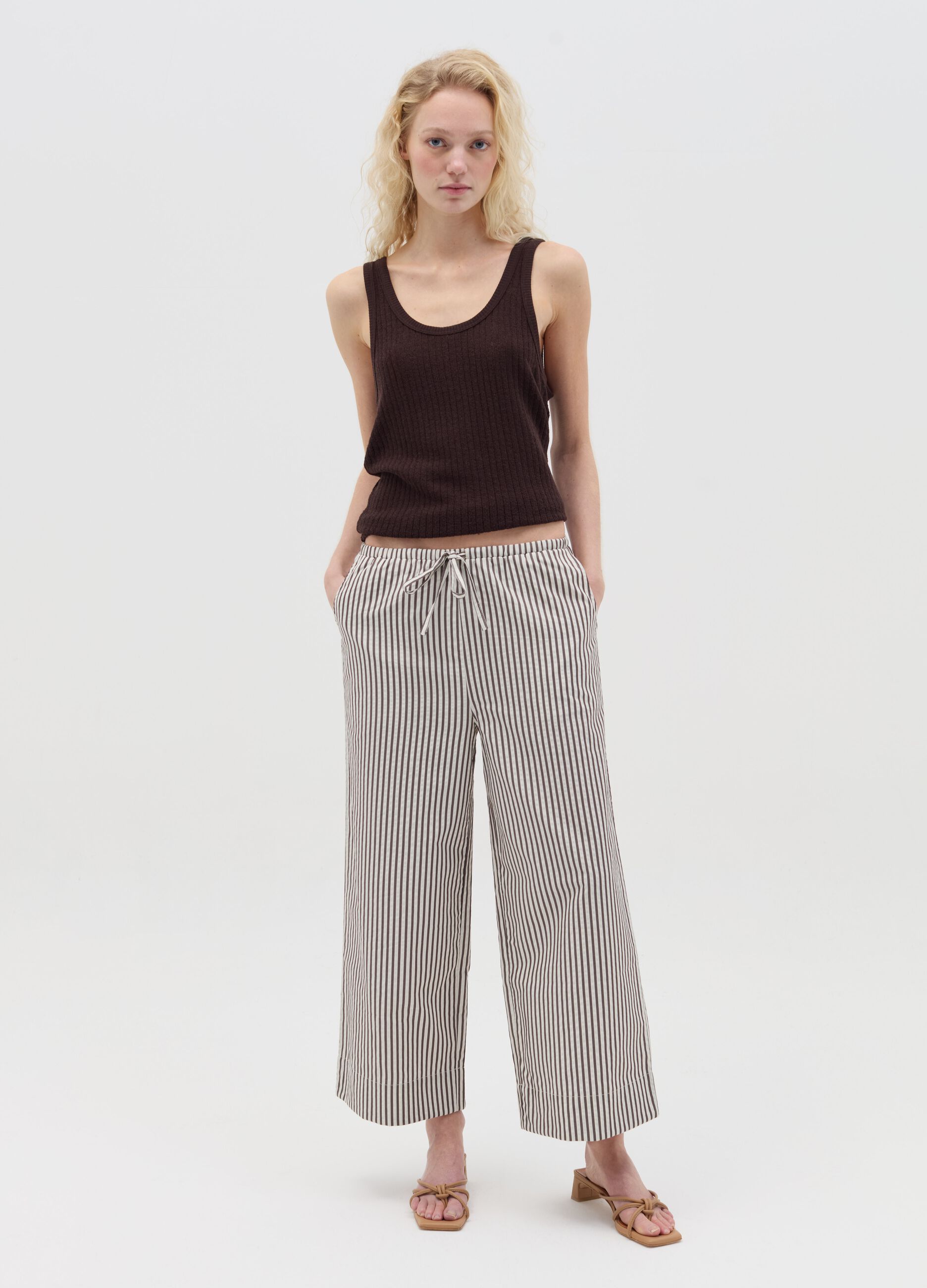 White and brown wide-leg trousers with stripes