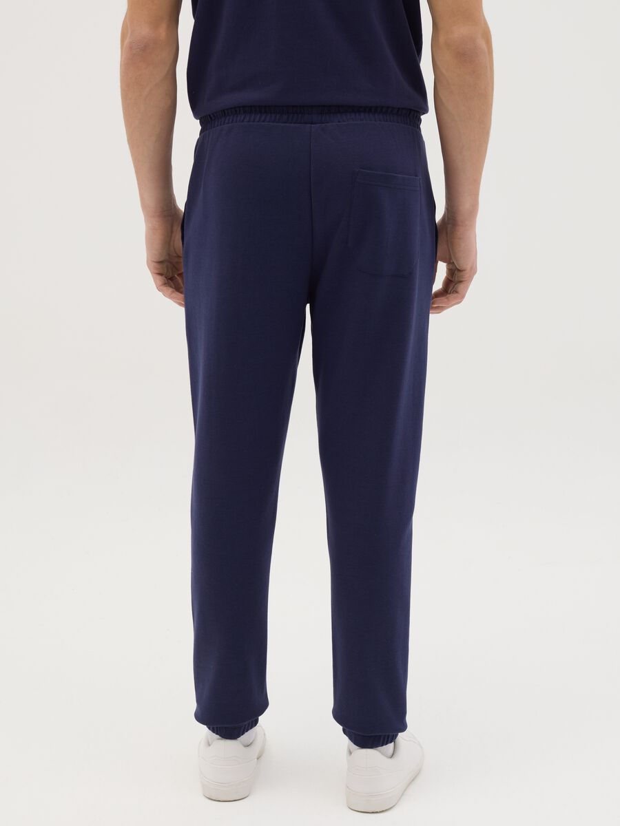 Blue joggers in fleece with logo_3