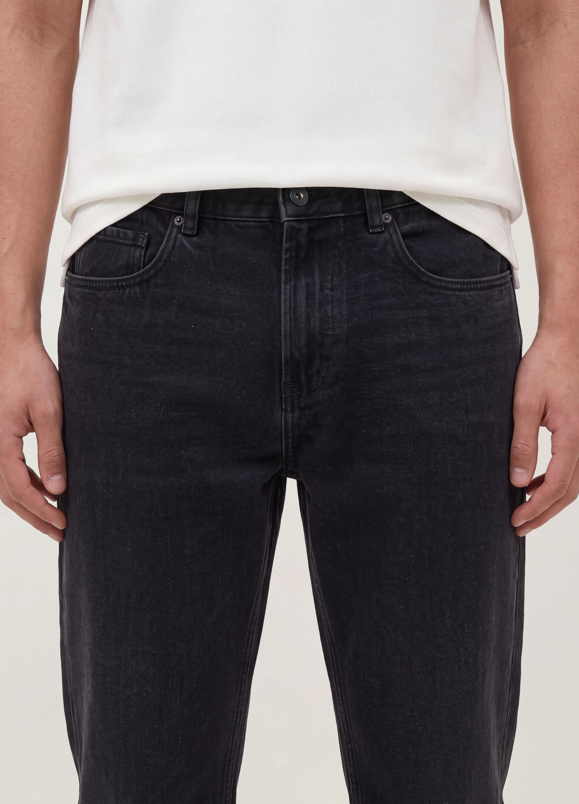 Black regular tapered jeans in a cotton, lyocell and viscose blend