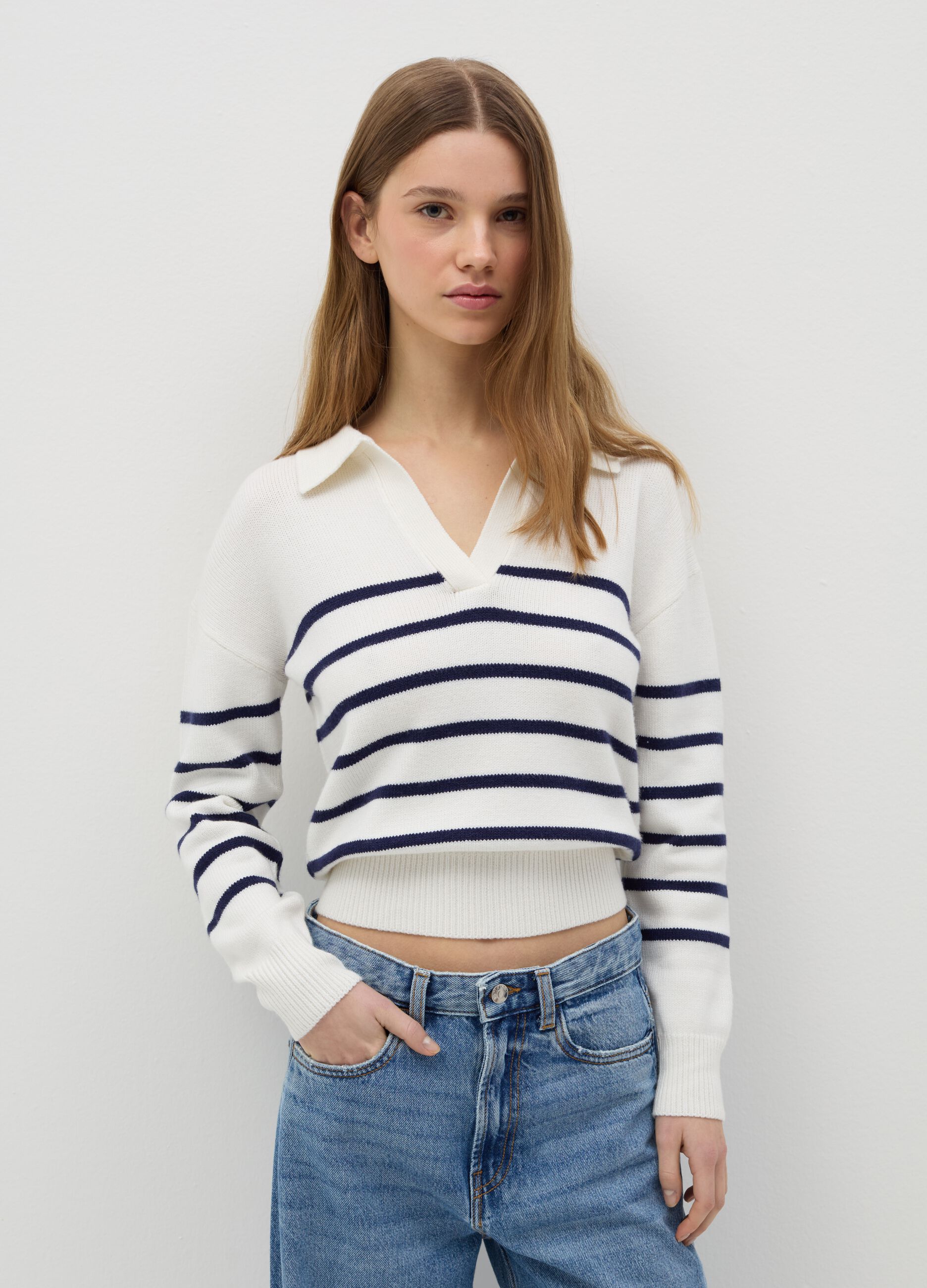 Top with blue and white stripes and polo neck