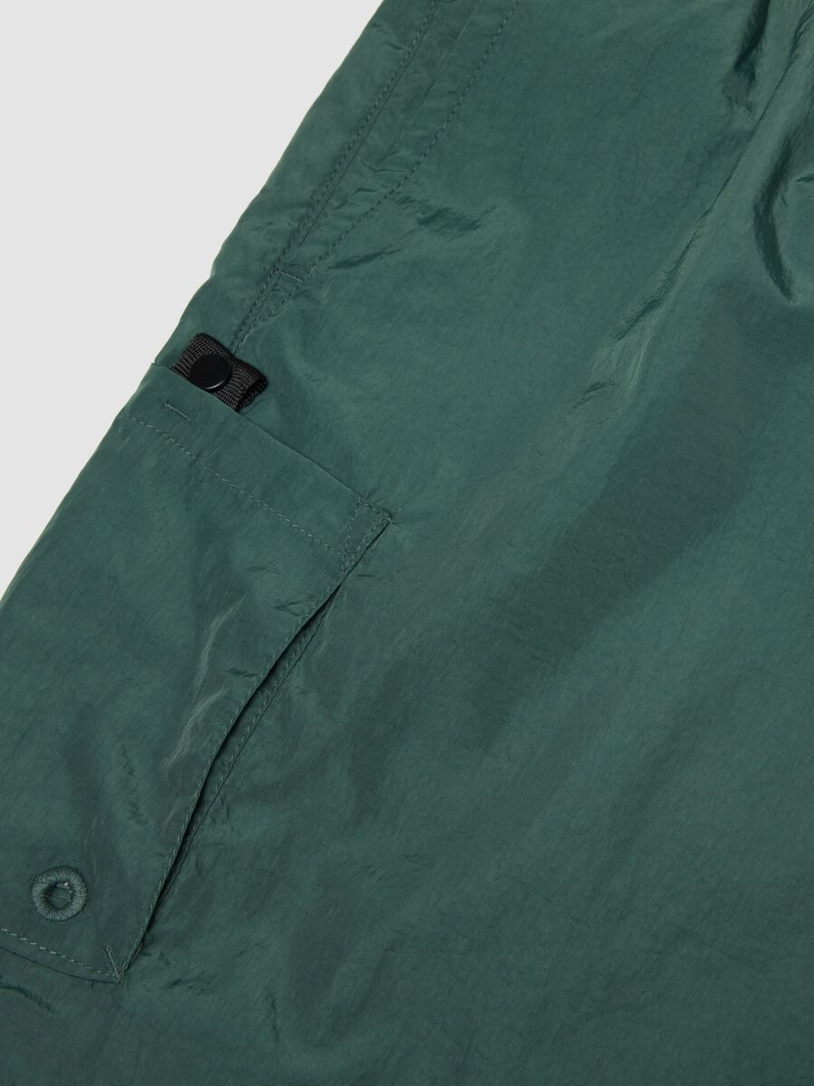 Green swim shorts with elasticated waistband_1