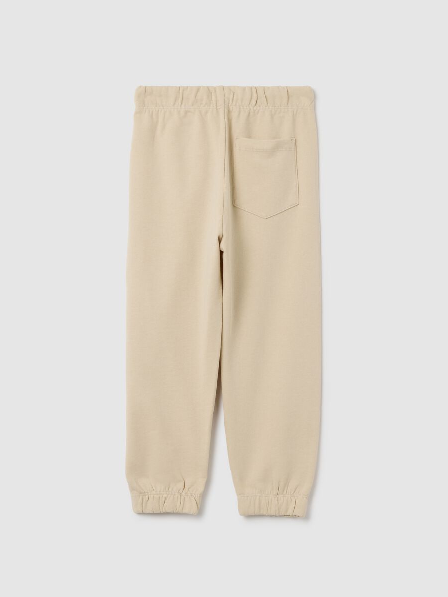 Children's beige regular fit jogger trousers in pure cotton_1