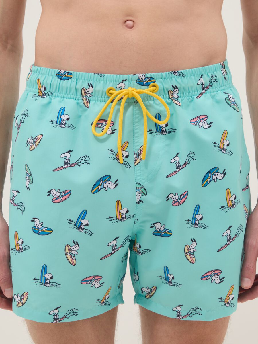 Costume azzurro con stampe Snoopy surf_1
