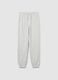 Grey cotton boy's jogger trousers with an oversized fit_0