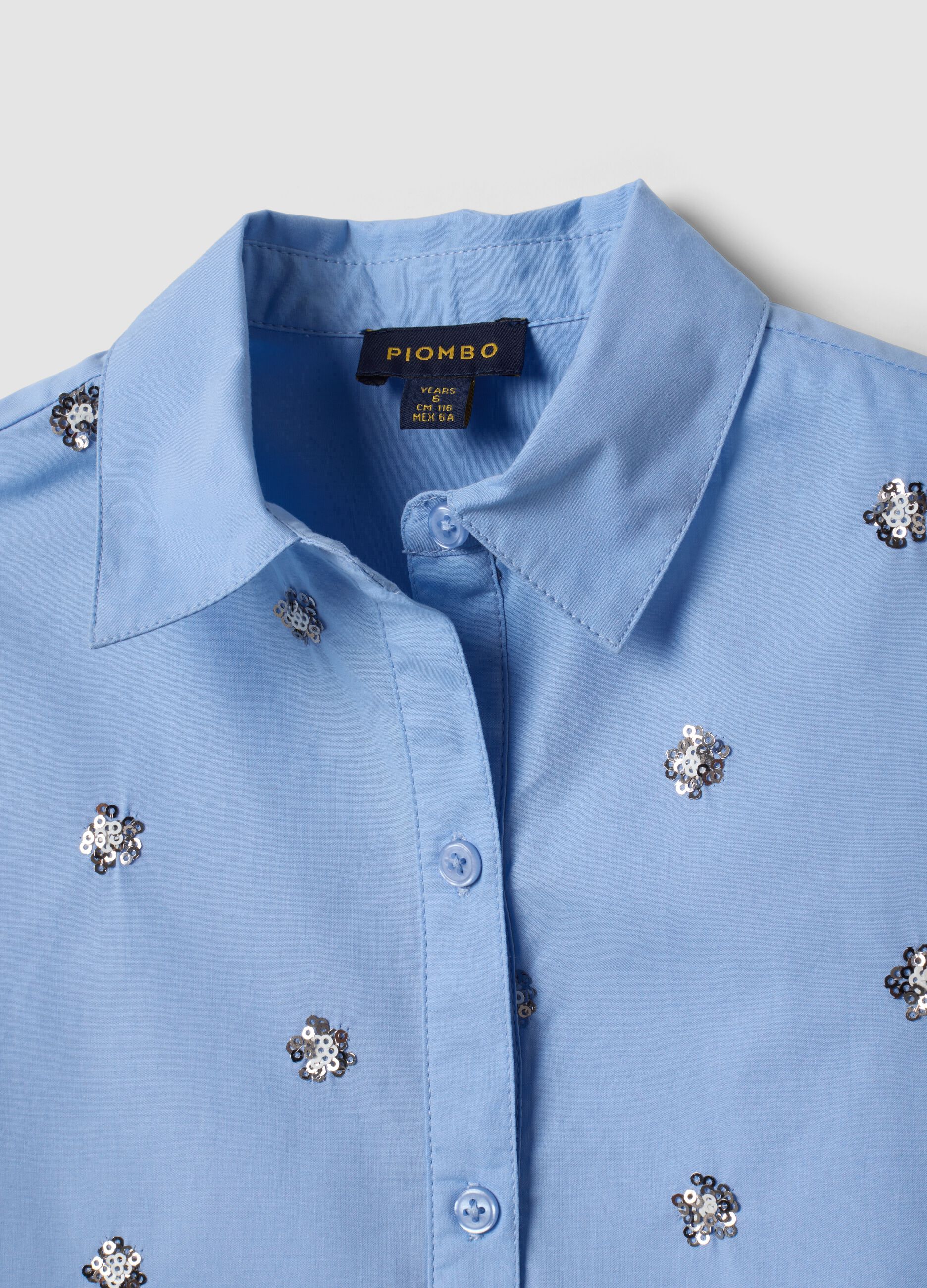Light blue oversized pure cotton shirt with floral sequins