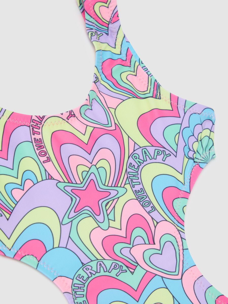 Girl's one-piece swimsuit in multicoloured stretch fabric with cut-outs_2