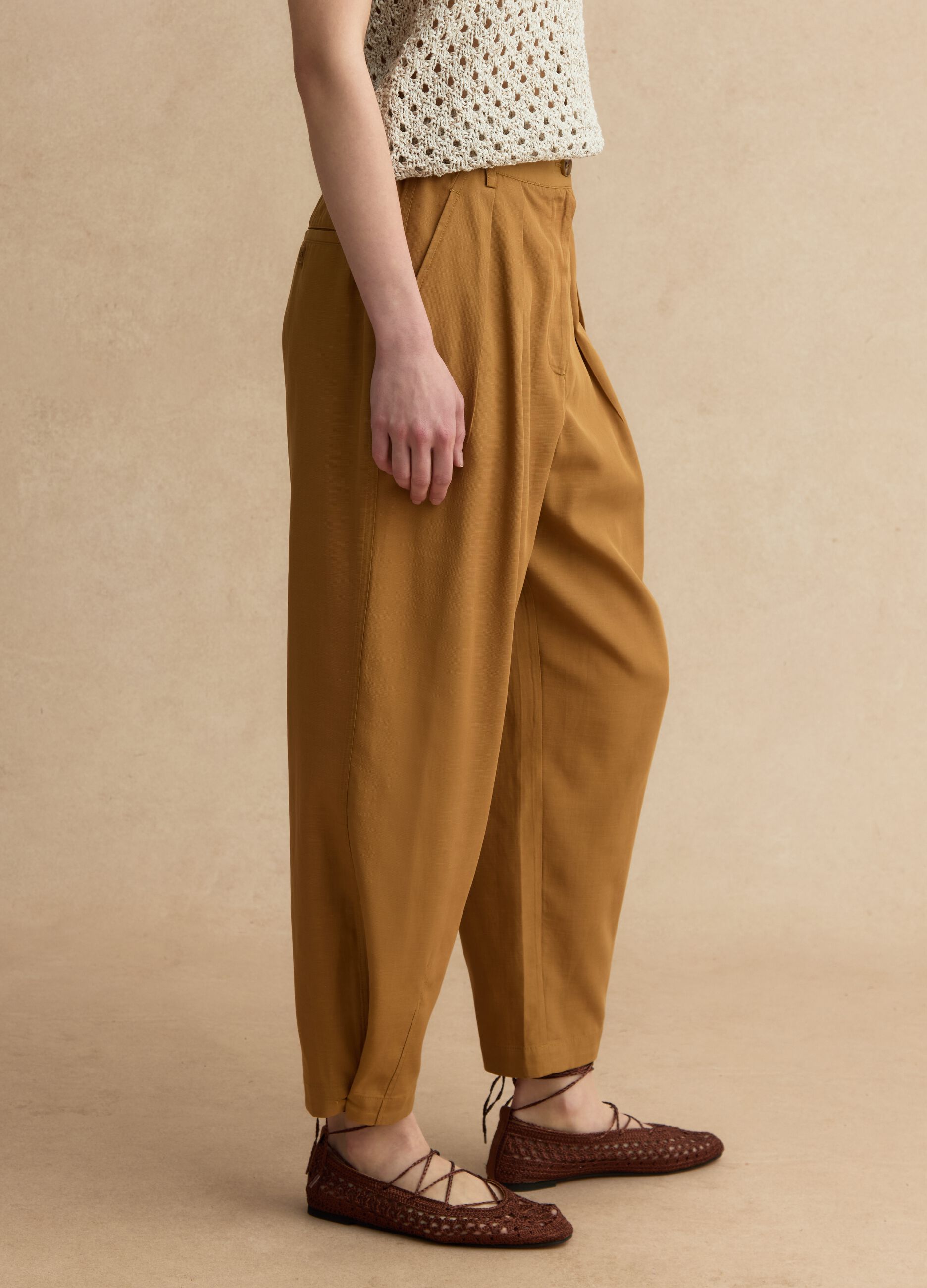 Brown lyocell-cotton blend slouchy fit trousers