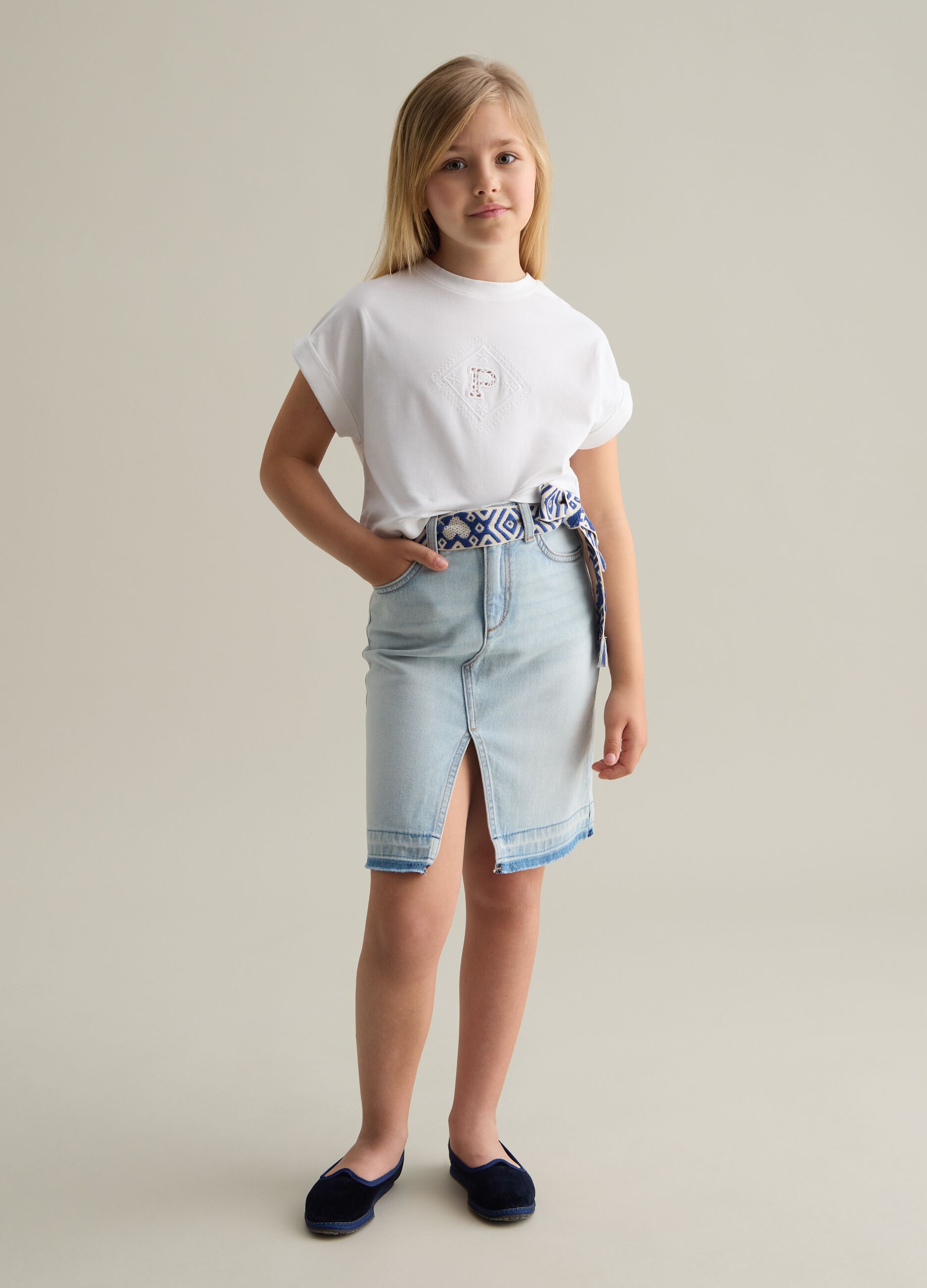 Denim skirt with ethnic belt in cord