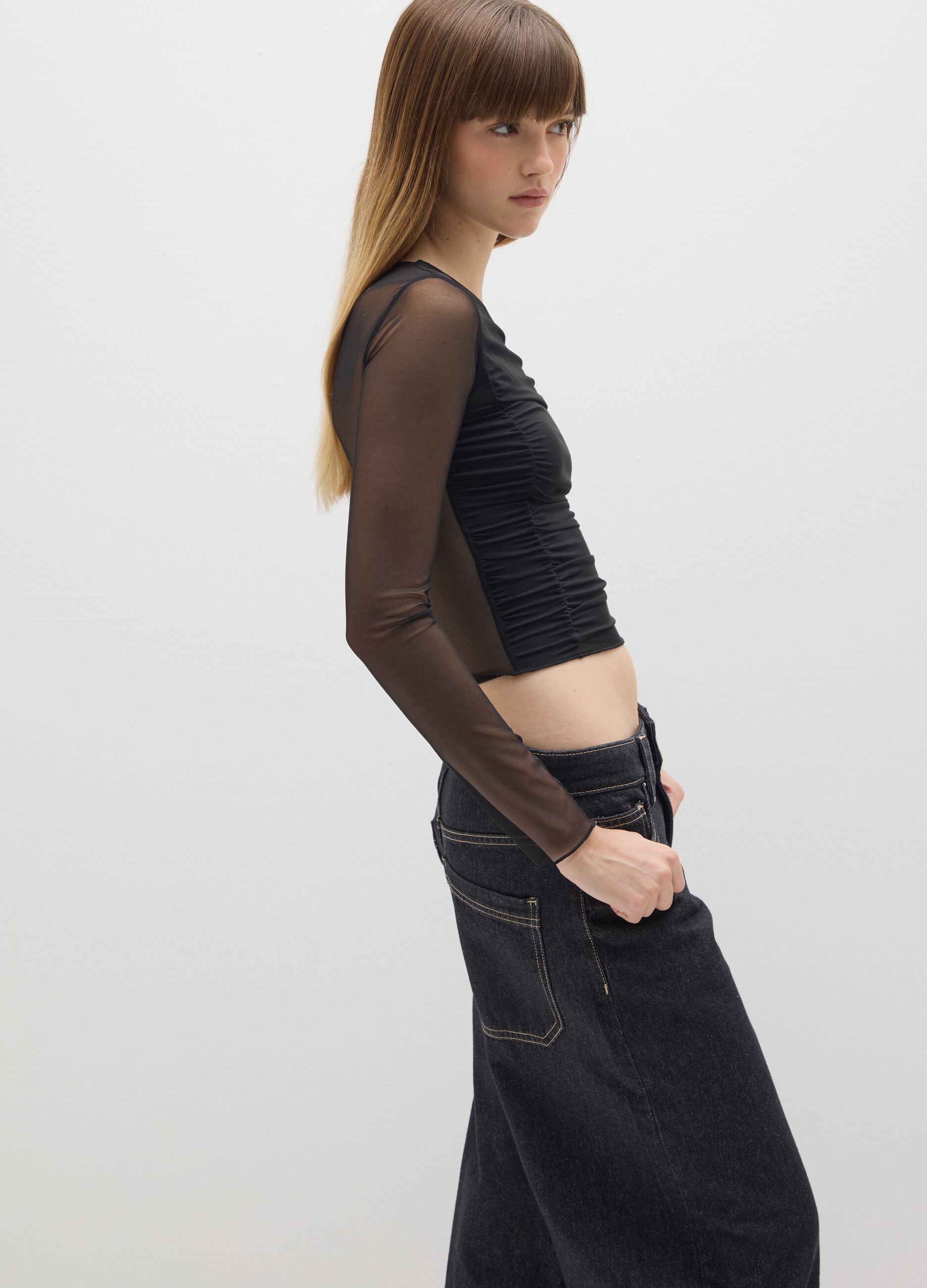 Long-sleeve black top in stretch fabric