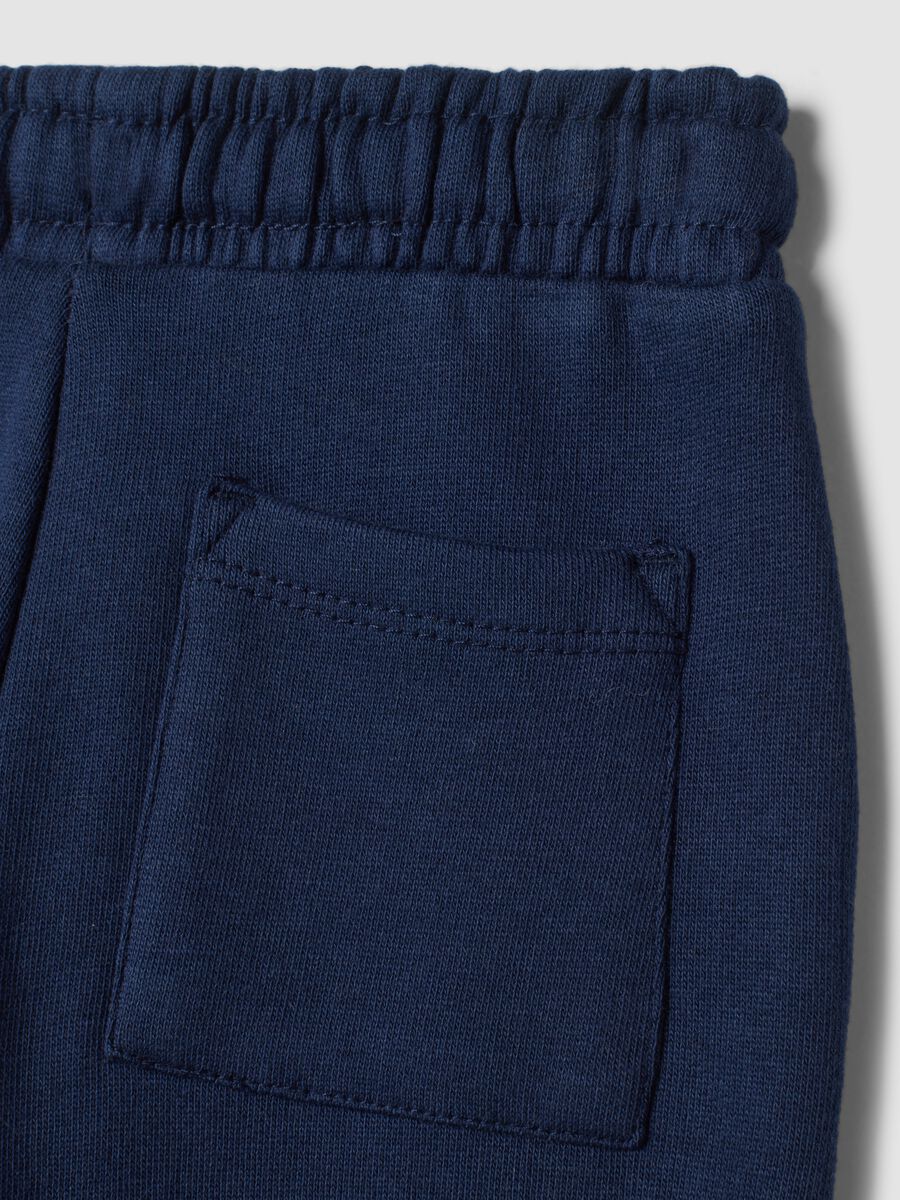 Pantaloni jogger blu notte in puro cotone over fit con stampa animaletto_3