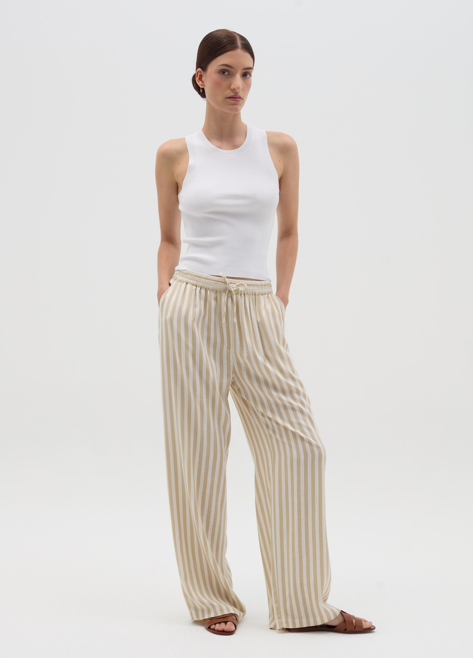 Striped beige palazzo trousers in viscose and linen