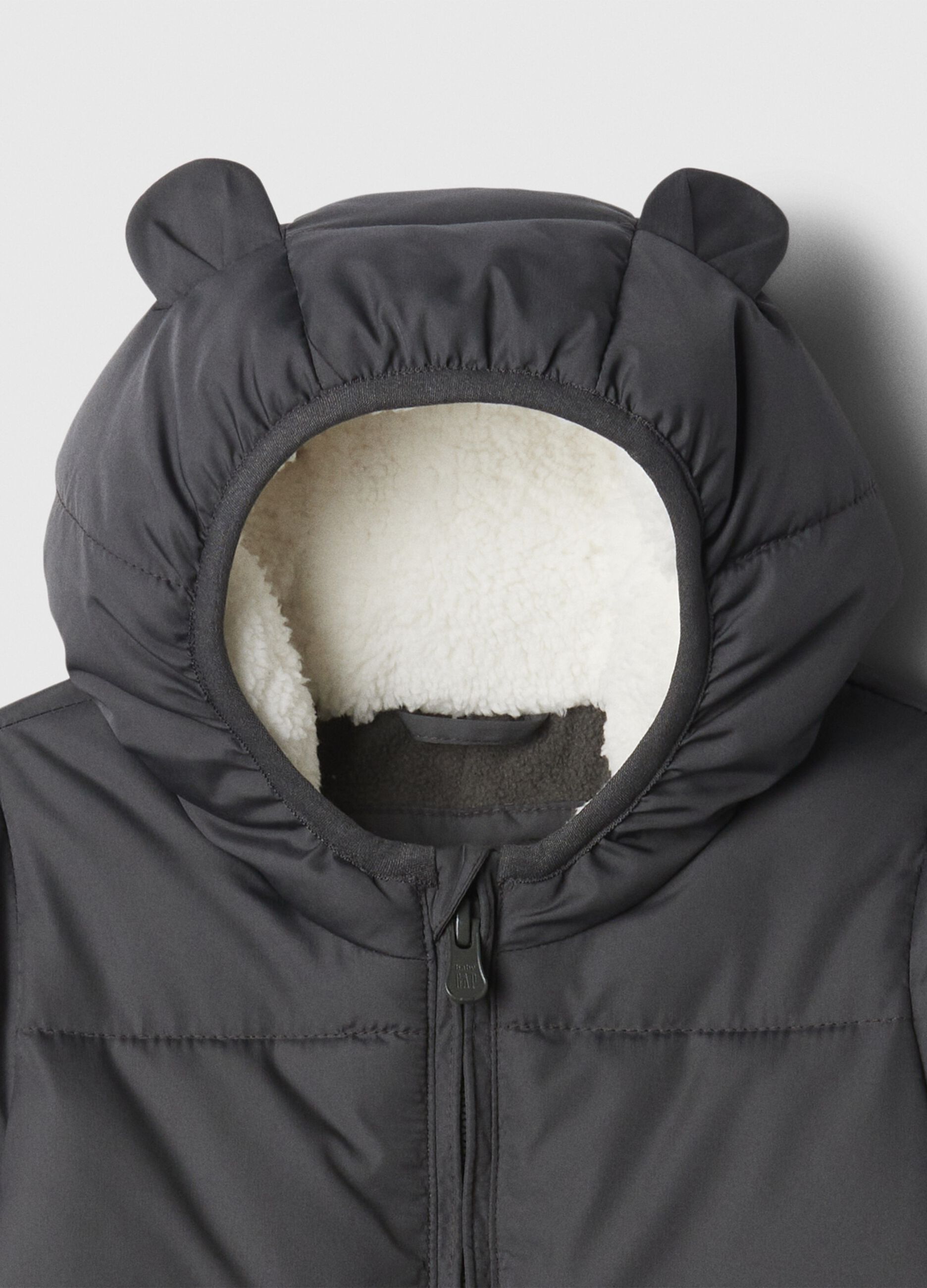 Onesie with hood and sherpa lining.