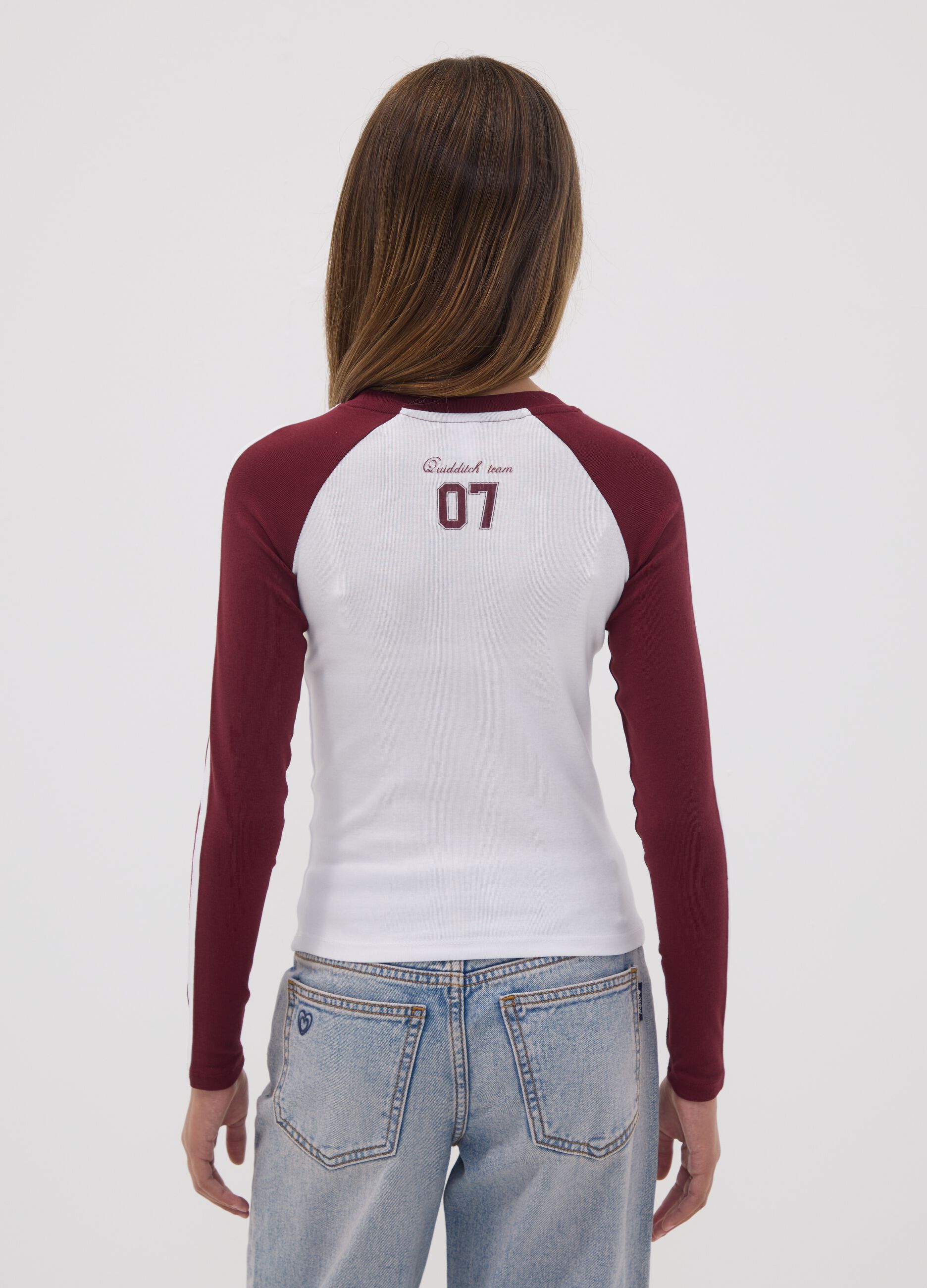White stretch cotton girls&rsquo; T-shirt with Hogwarts crest