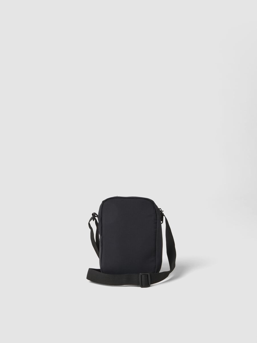 Borsetta a tracolla nera con chiusura a zip e tracolla regolabile_1