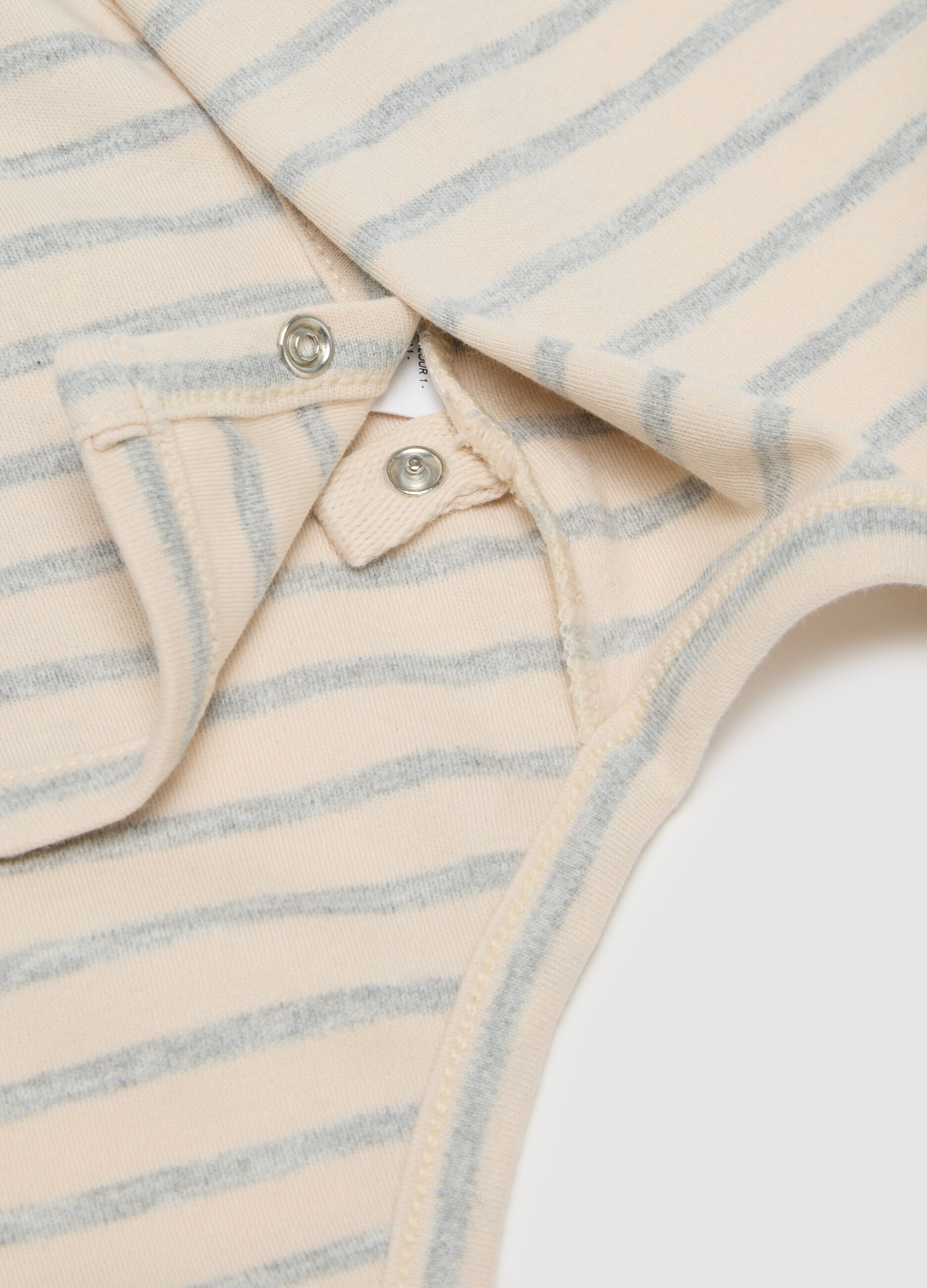 White and beige cotton bodysuit