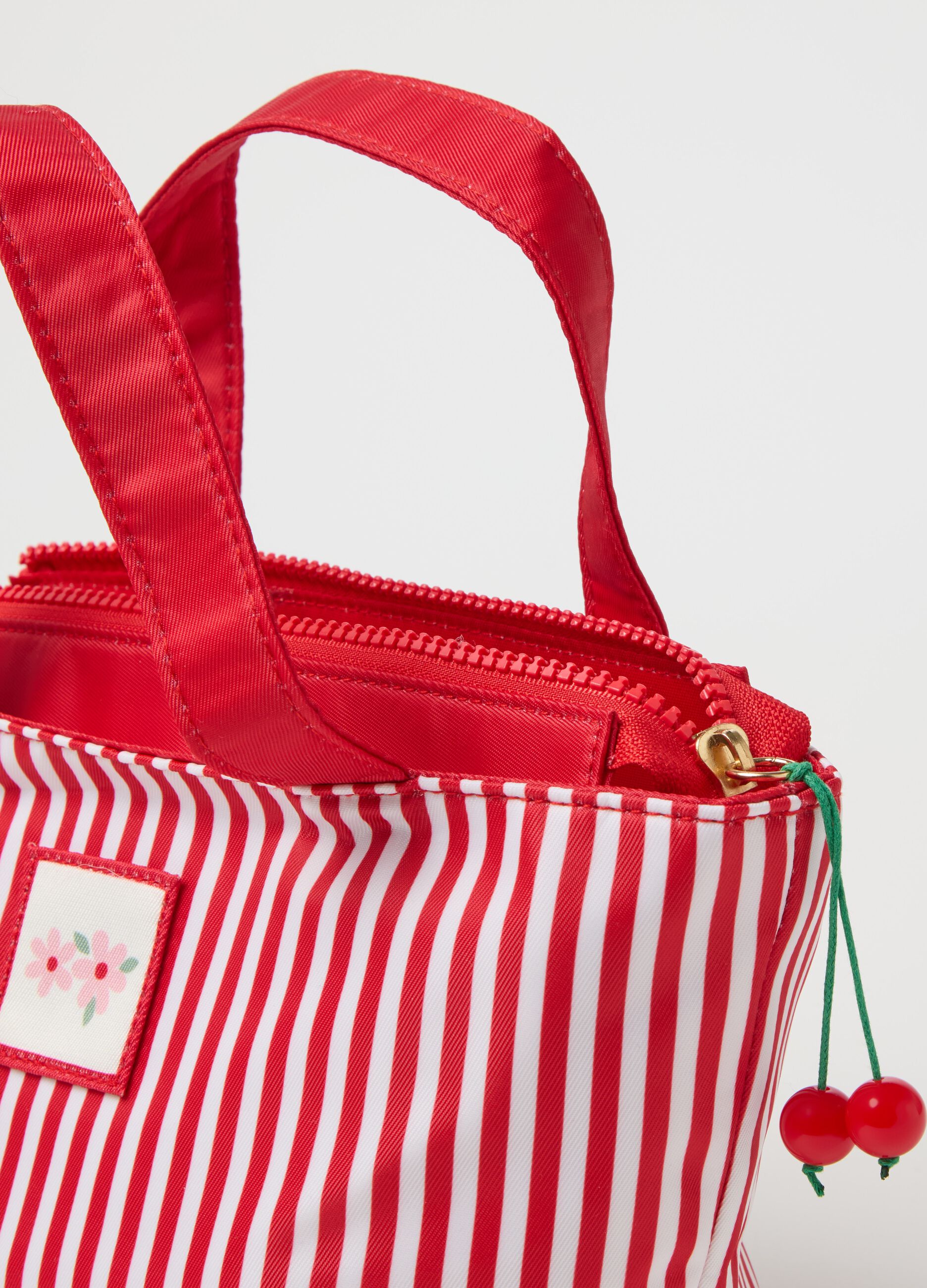 Small striped bag with handles