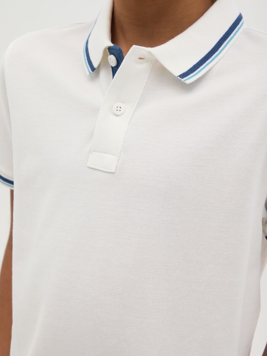 Polo da bambino in puro cotone bianca regular fit_1