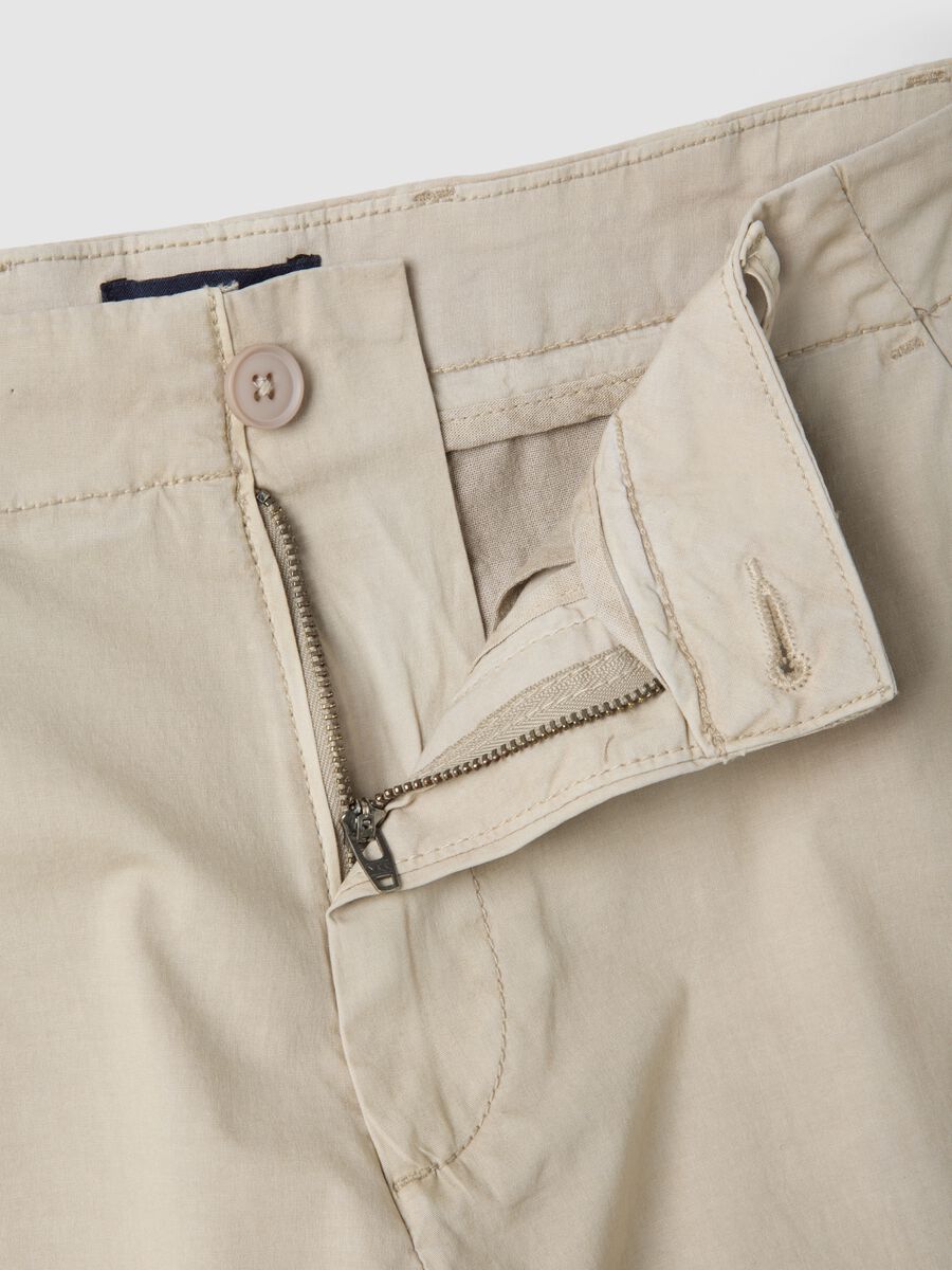 Pantaloni chino in cotone elasticizzato beige slim fit_1