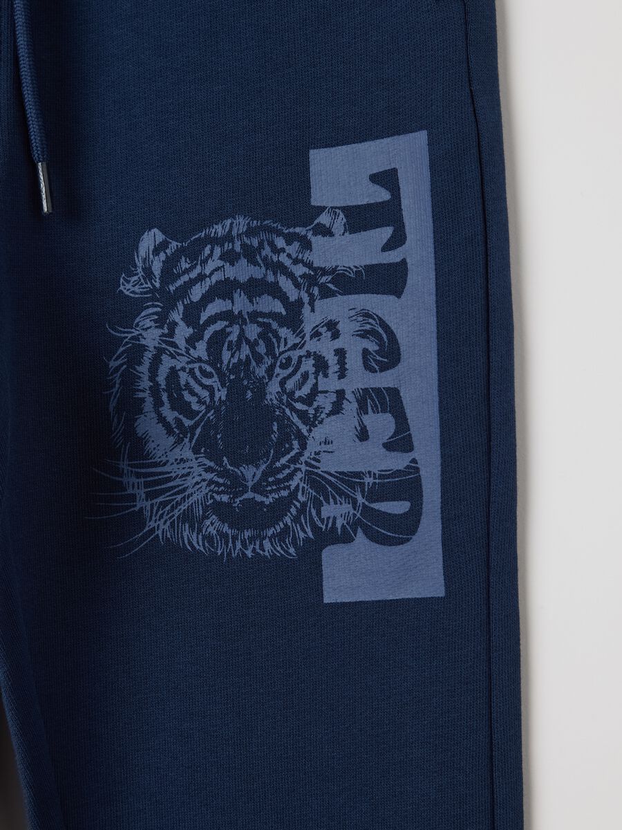 Blue cotton joggers with drawstring and print_3