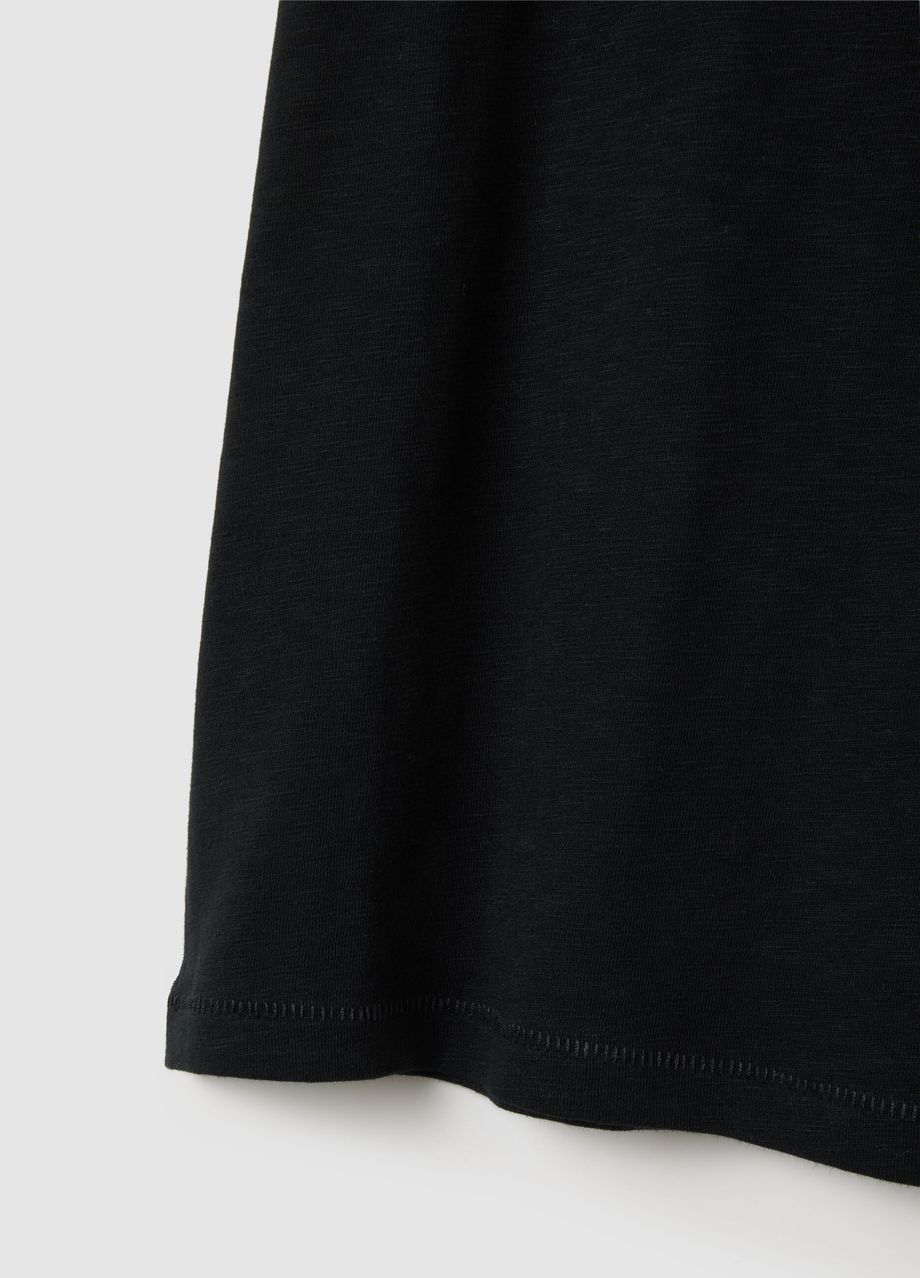 T-shirt in cotone con tasca