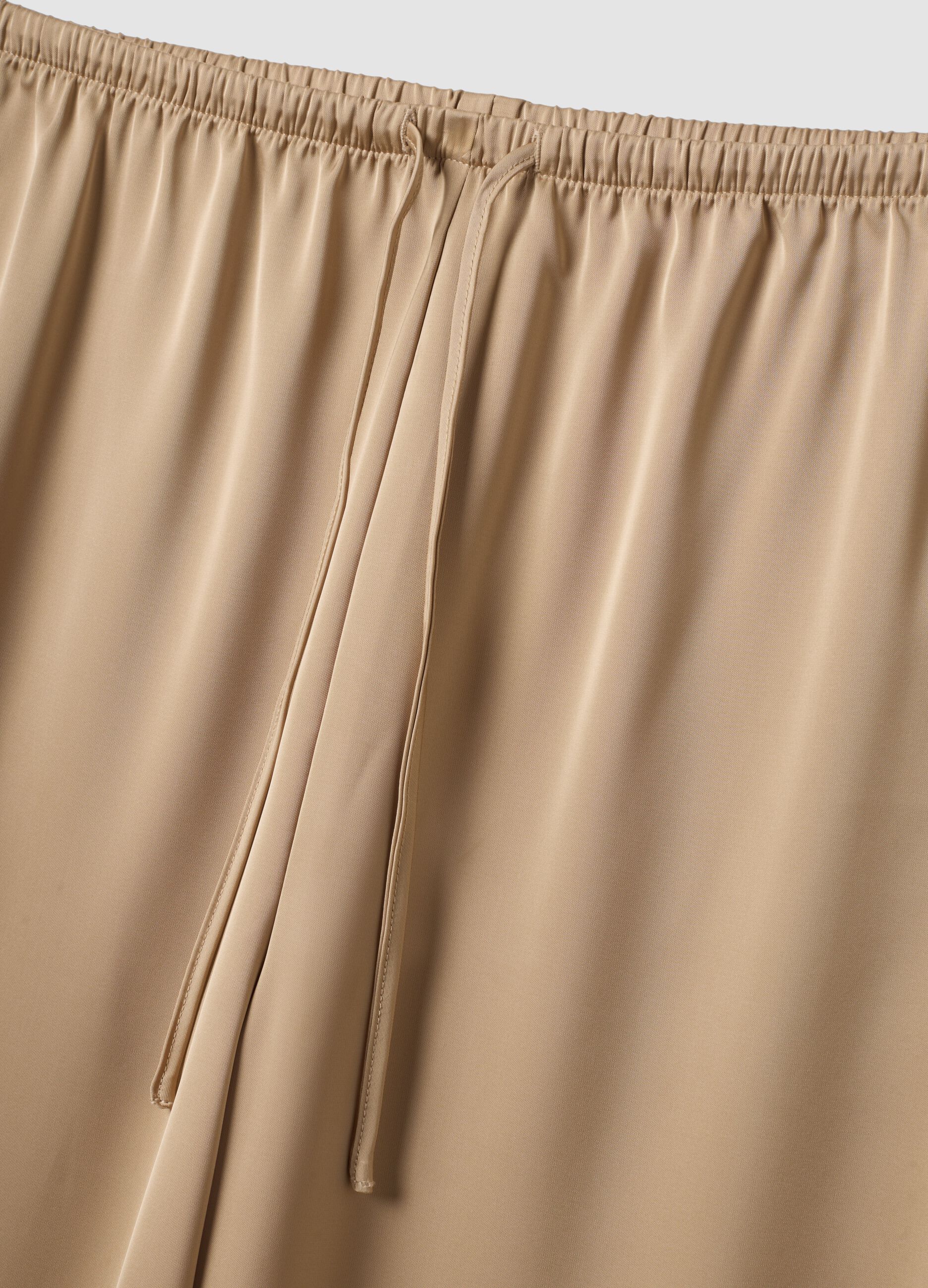Beige wide-leg trousers with regular waist