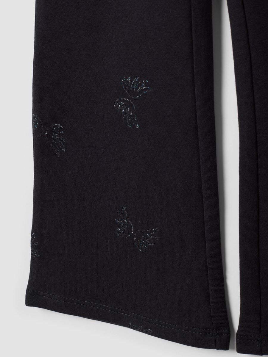 Treggings flare neri in cotone organico elasticizzato con ali glitterate_3