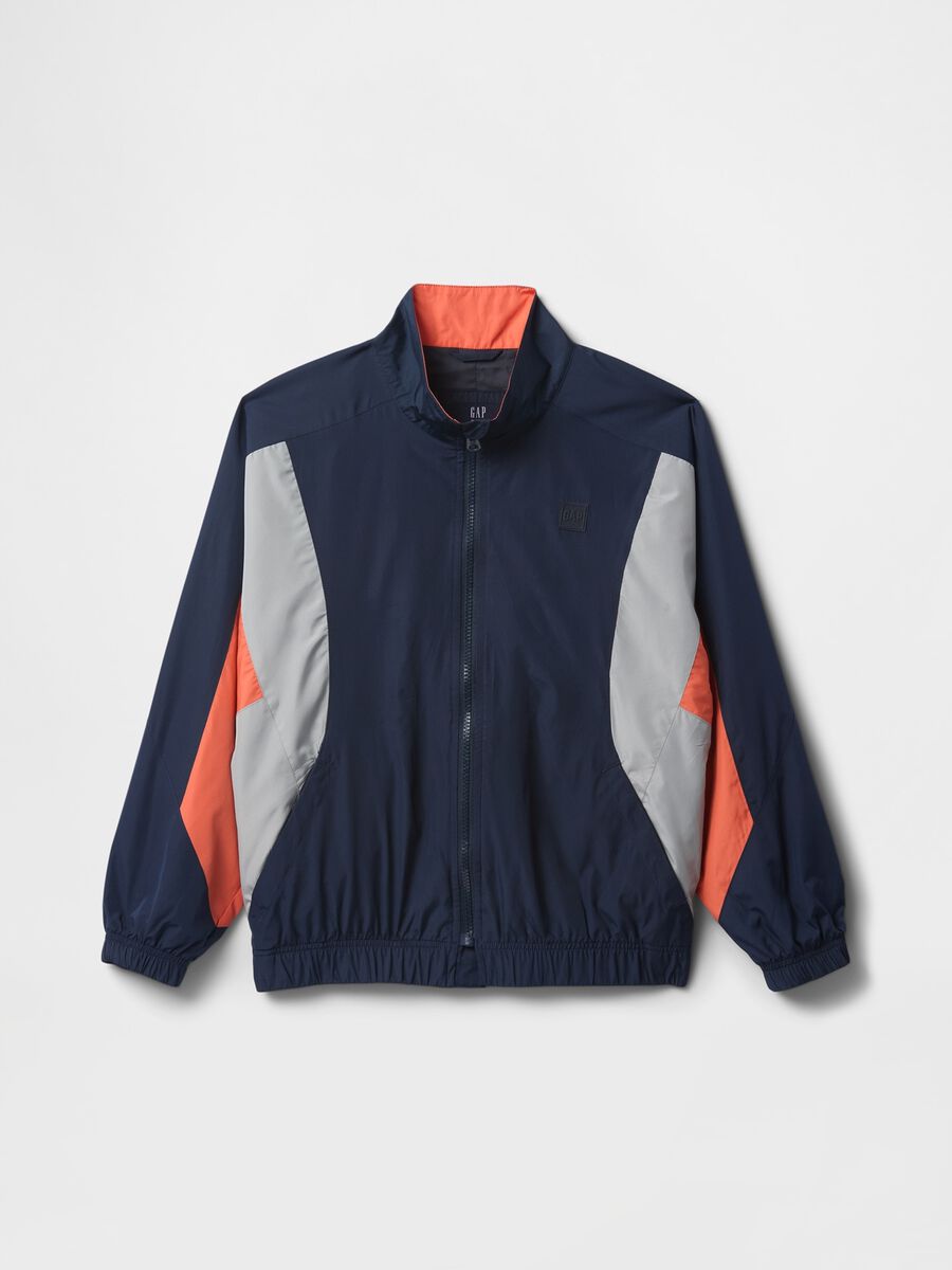 Light blue jacket with orange and grey accents_0