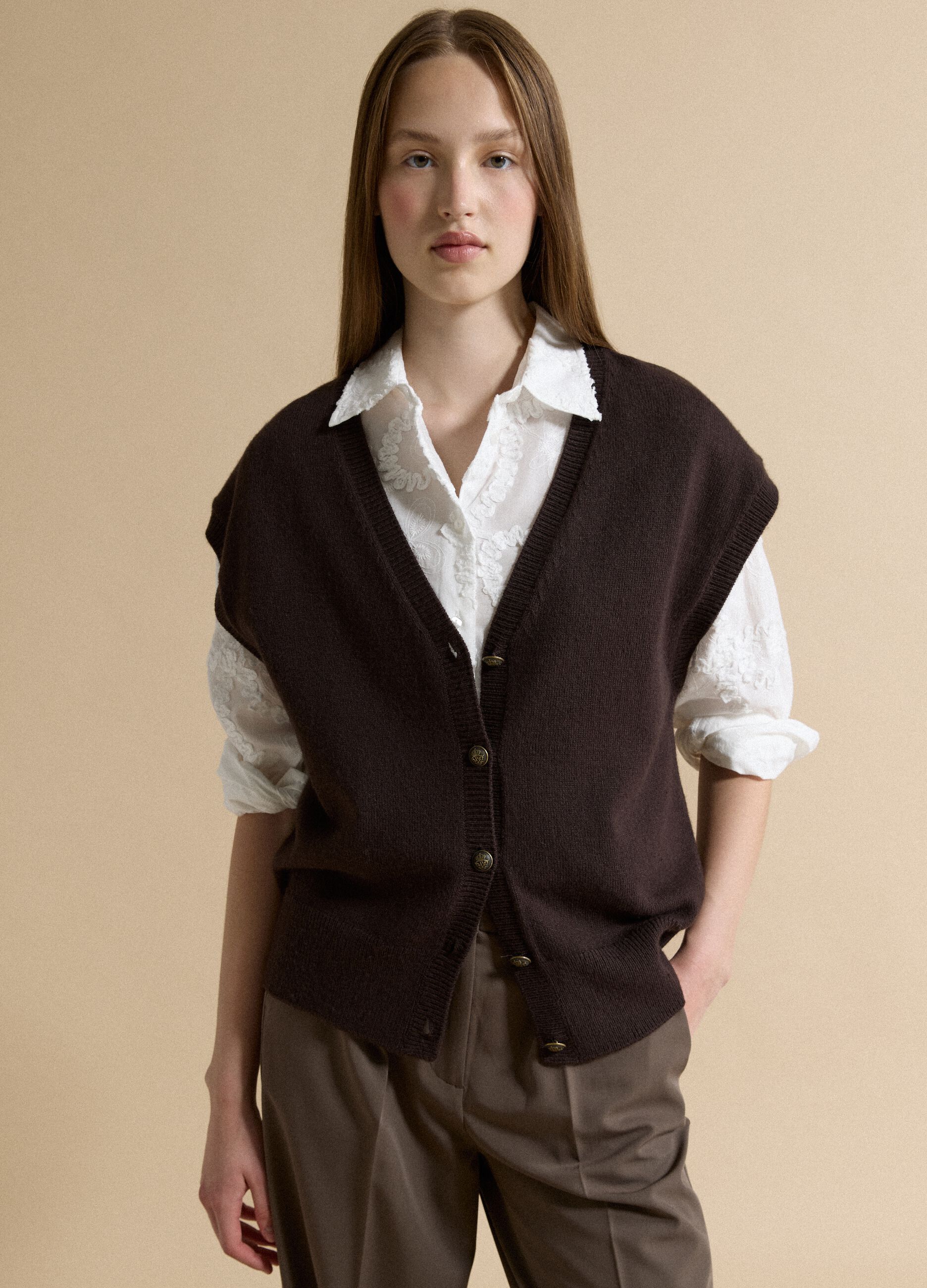 Brown V-neck button-up vest with oversized fit