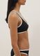 Black stretch fabric bikini top with white trim_3
