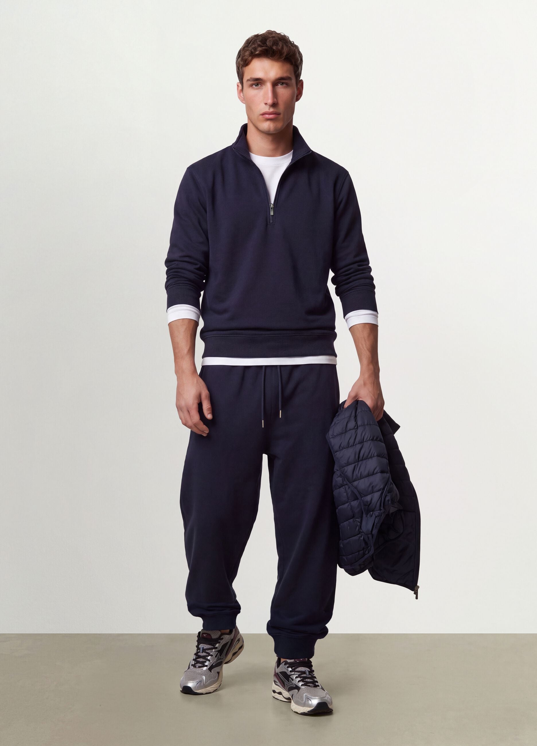 Blue cotton-blend joggers with cuffed hem and drawstring