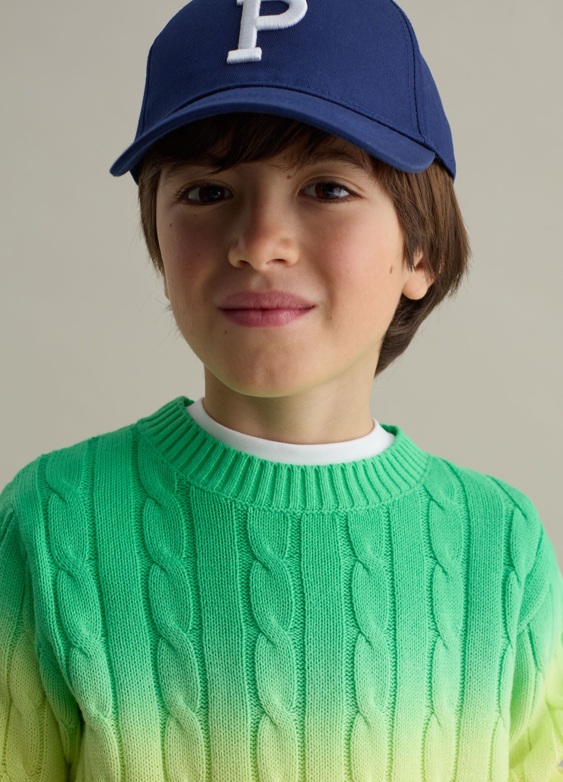 Dip-dye pullover with cable-knit design