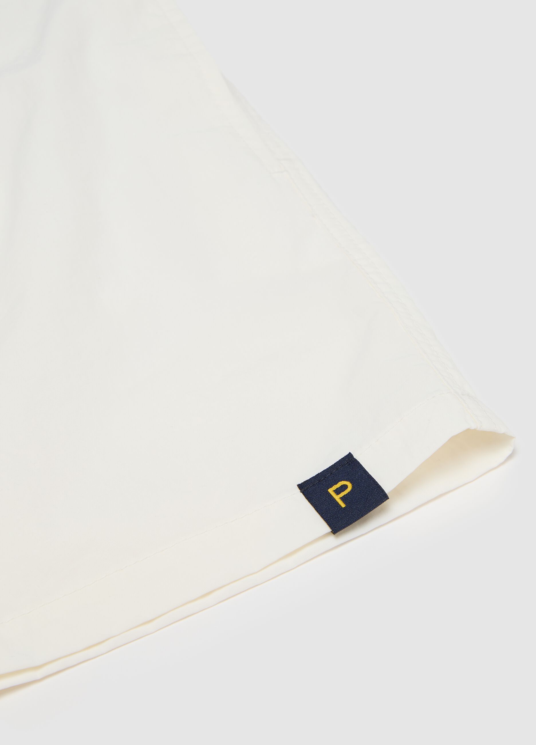 Men’s regular-fit swim boxers in white blend with elastic waist