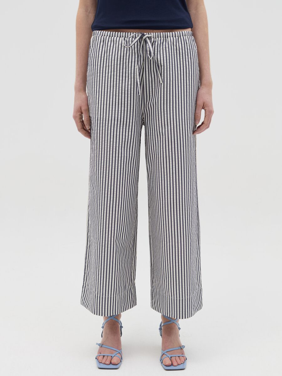 Blue and white wide-leg trousers with stripes_1