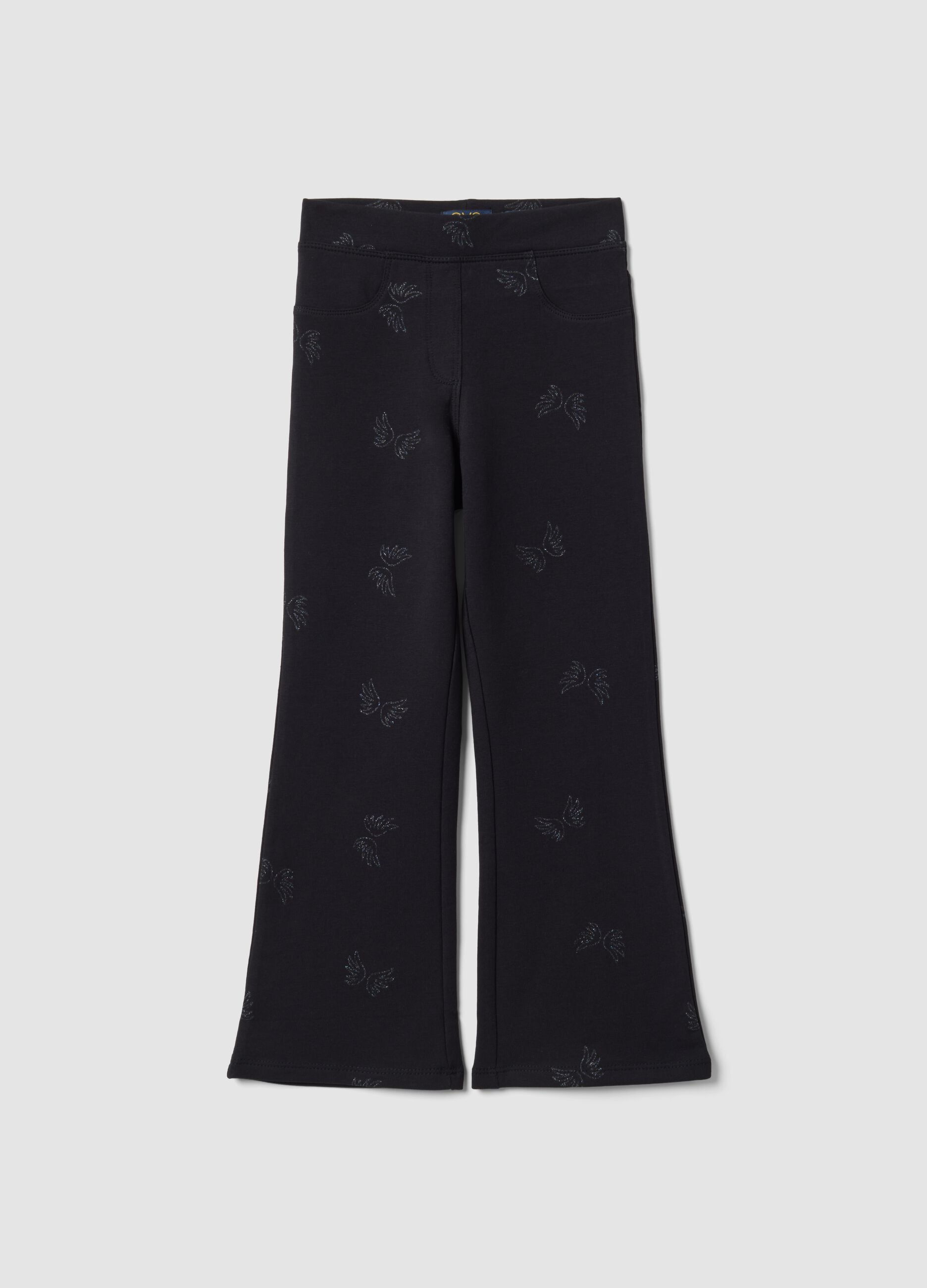 Treggings flare neri in cotone organico elasticizzato con ali glitterate