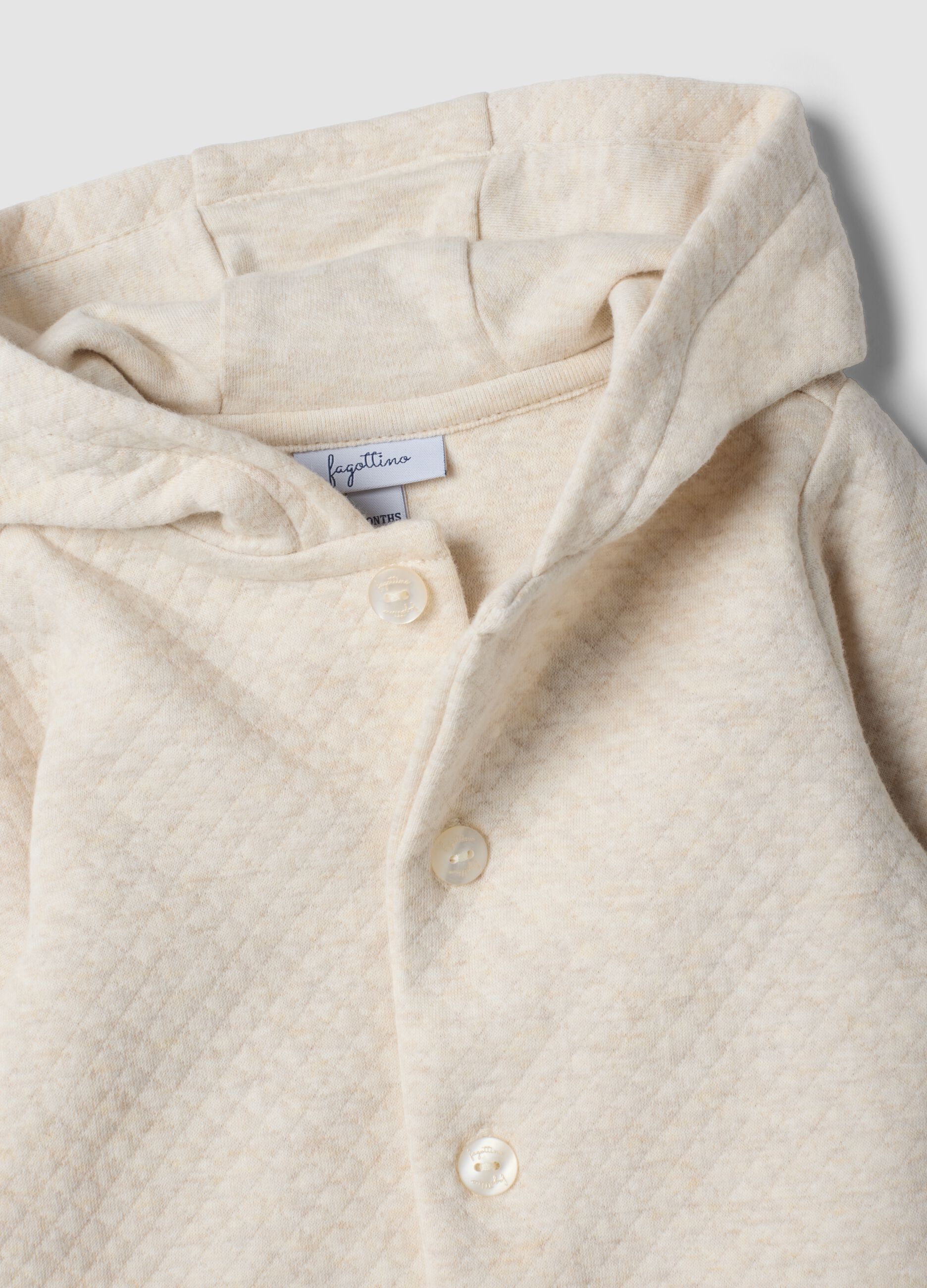 Tutina beige con cappuccio in misto cotone organico