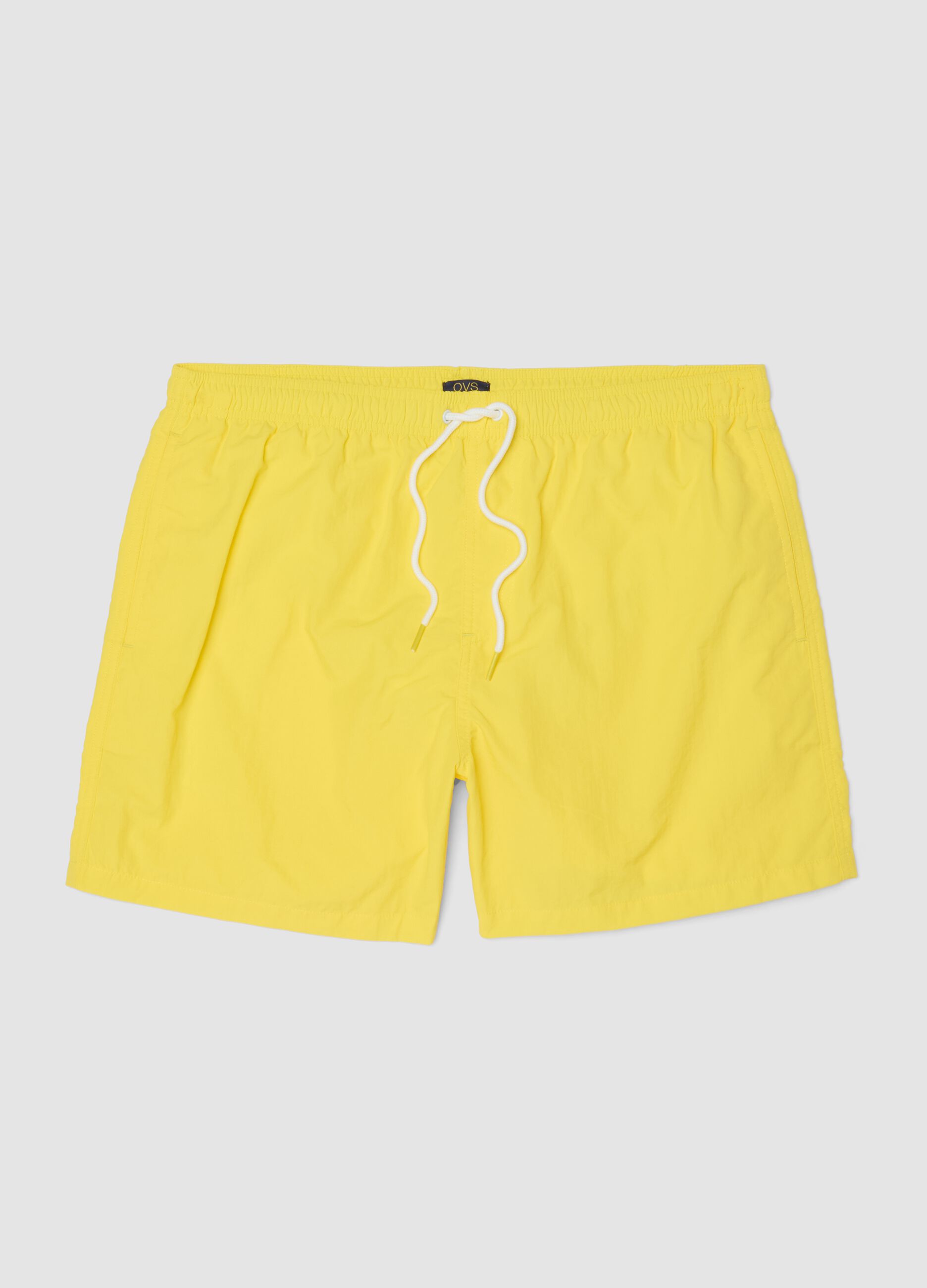 Yellow swim shorts with elasticated waistband