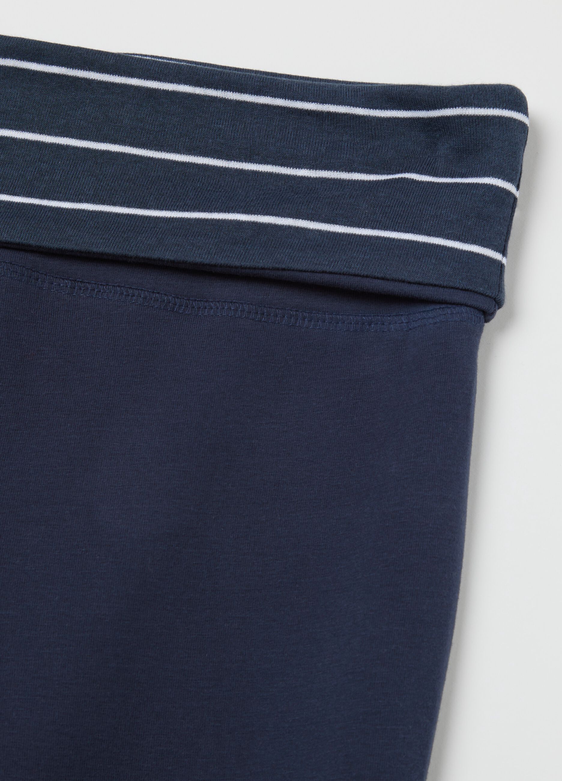 Blue flare-fit leggings with striped fold at the waist