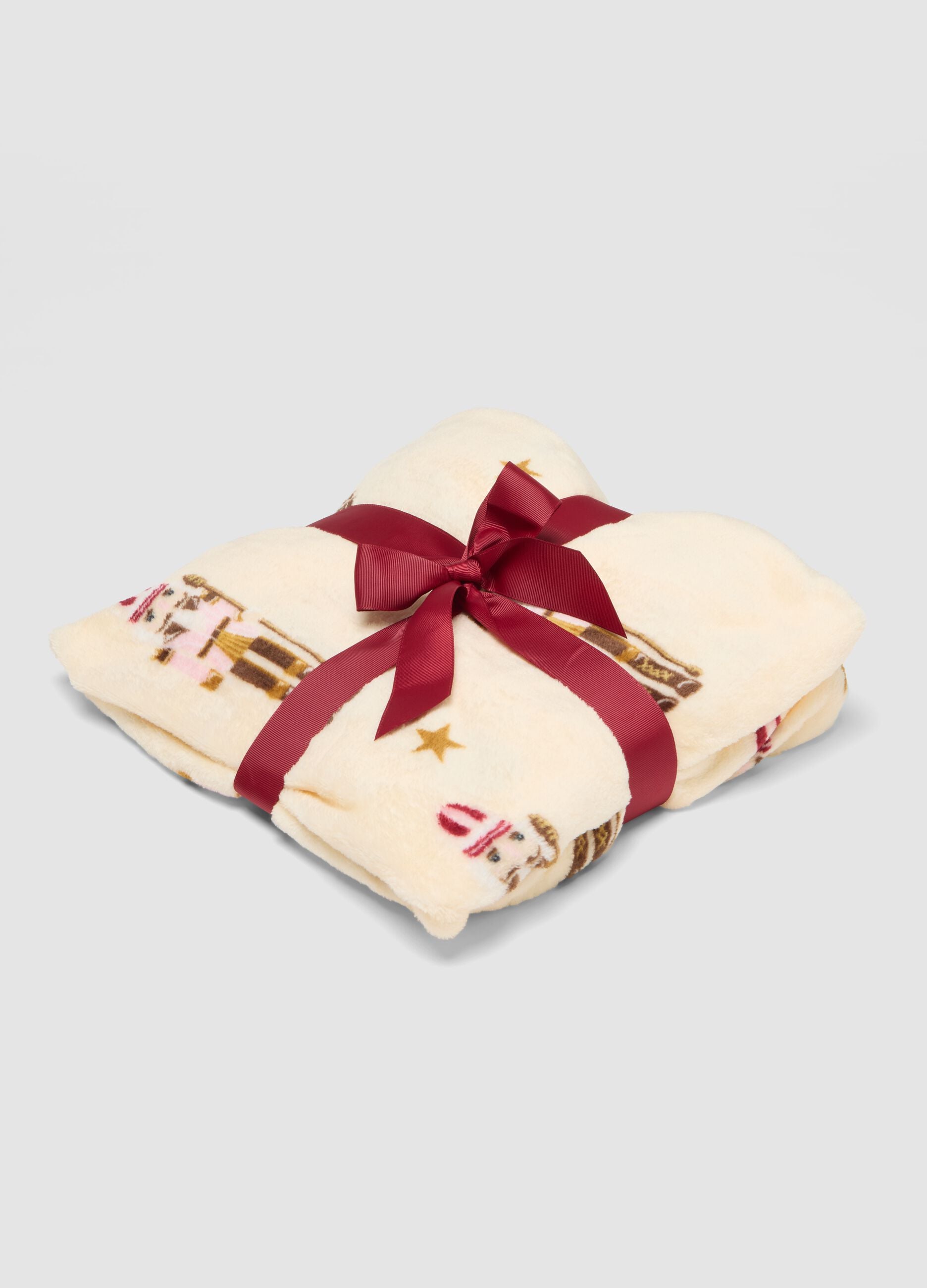 Coperta rosa e marrone con stampa natalizia