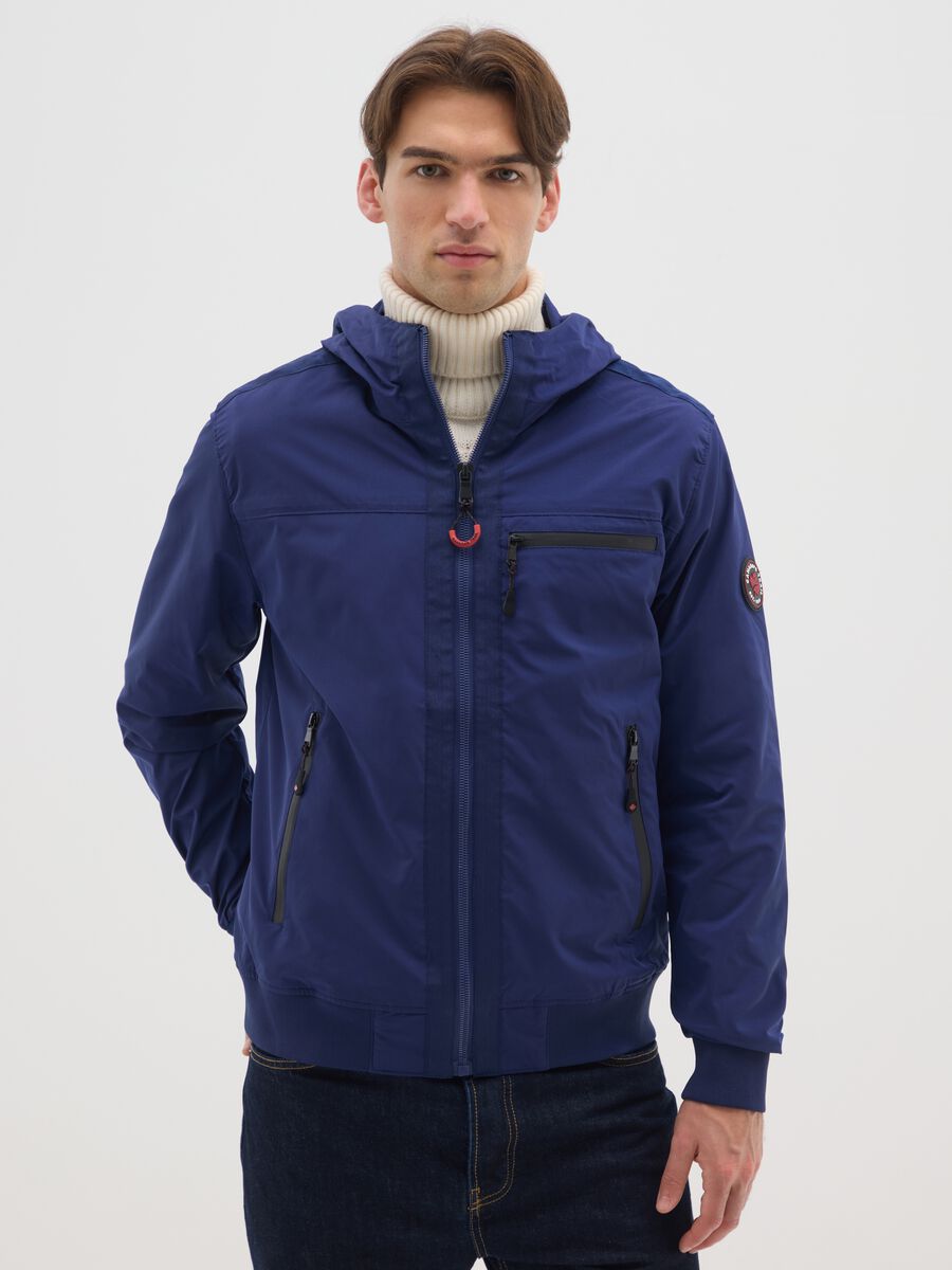Heavy fabric blue jacket with hood and zip_0