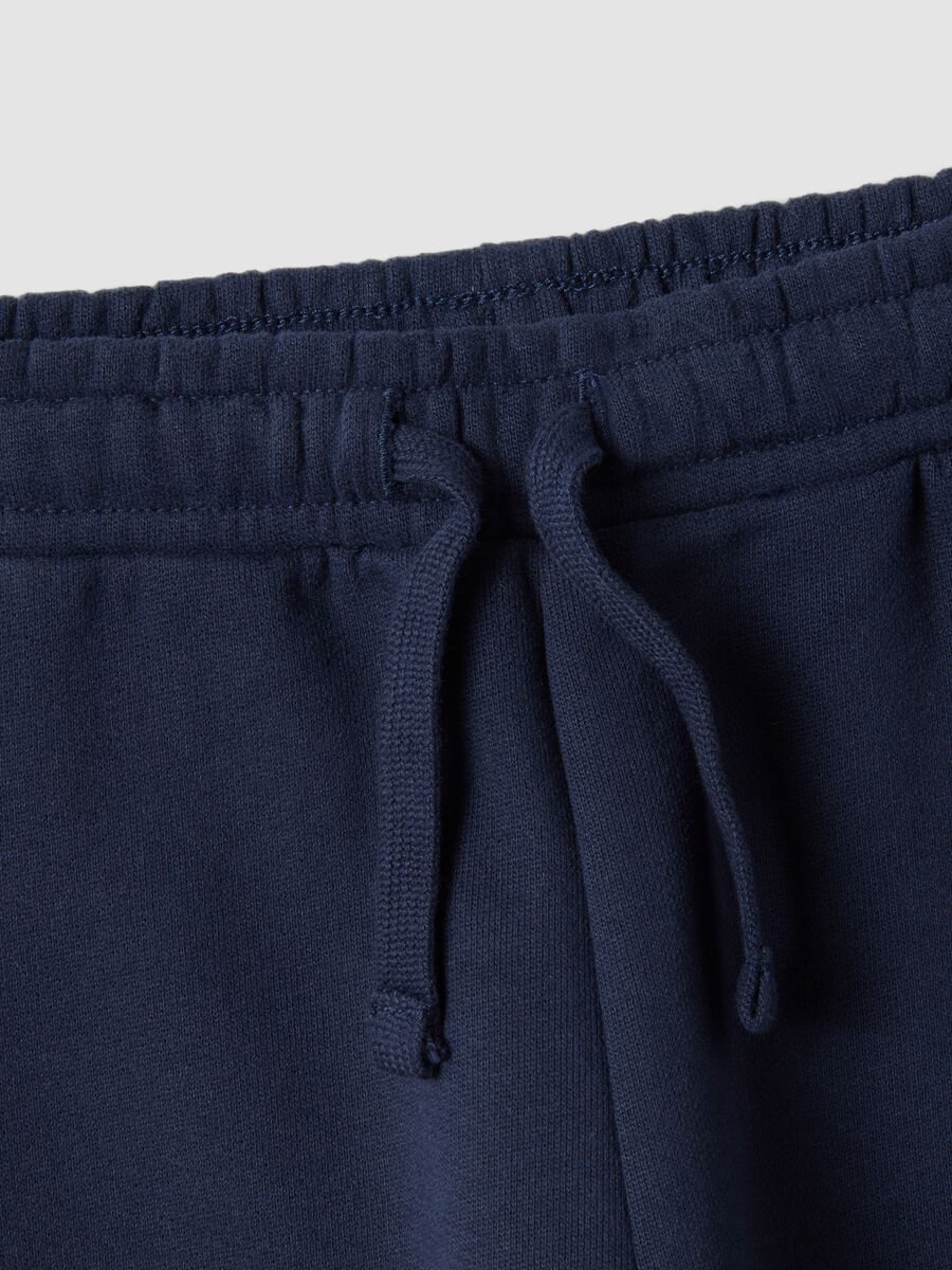 Pantaloni jogger blu in puro cotone con stampa orsetto over fit_3