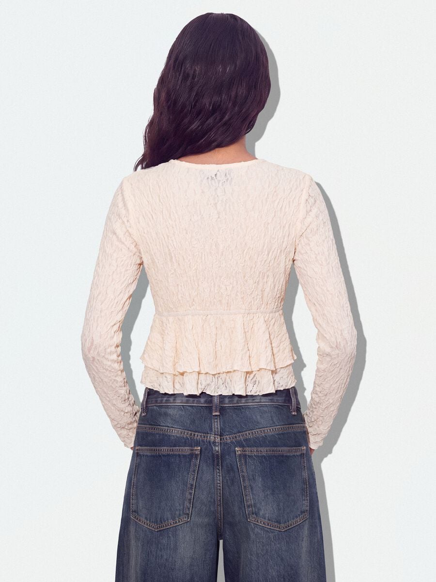 White stretch fabric top with deep V-neck and ruffle hem_2
