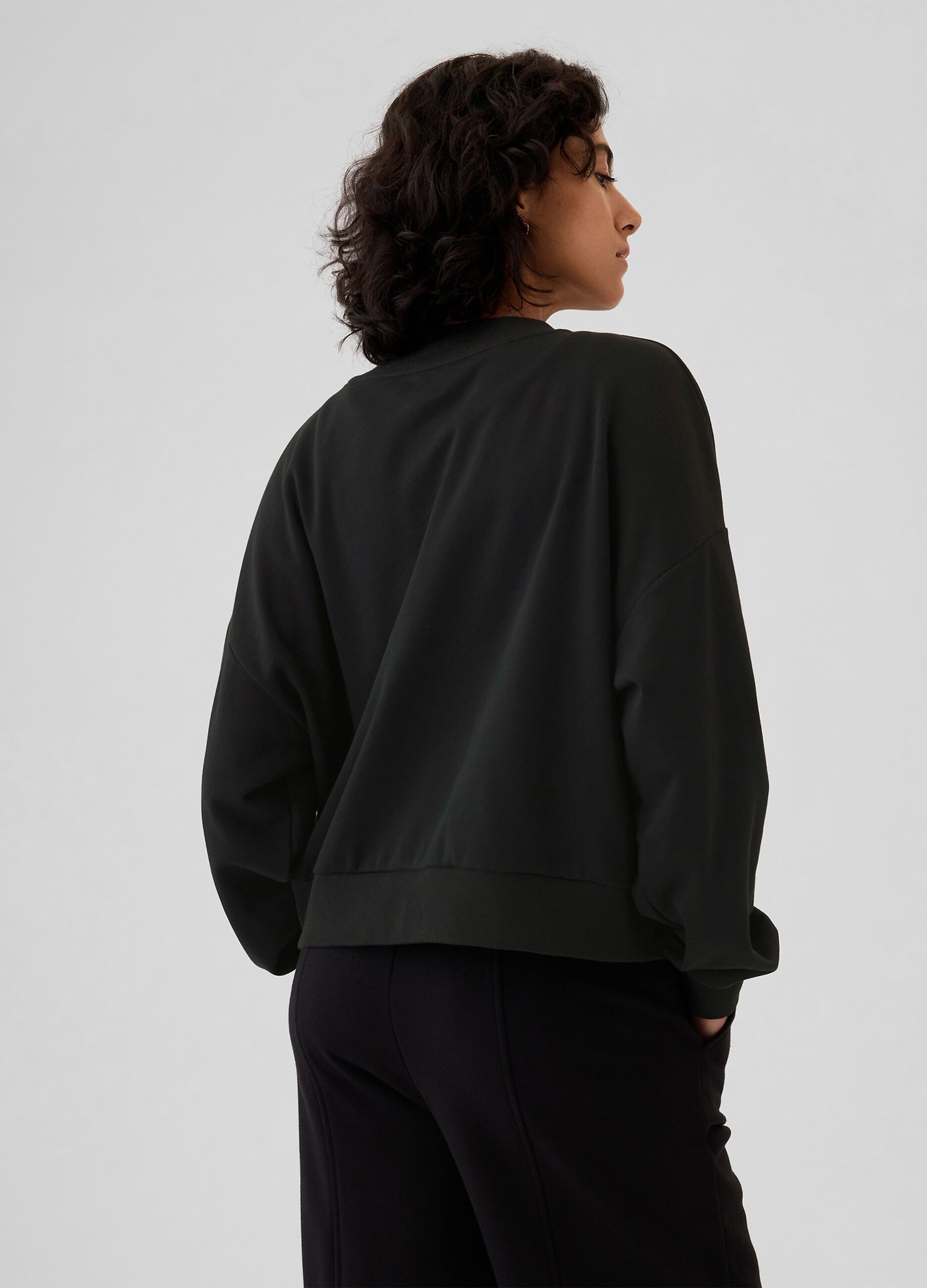 Oversized sweatshirt with buttons and logo embroidery